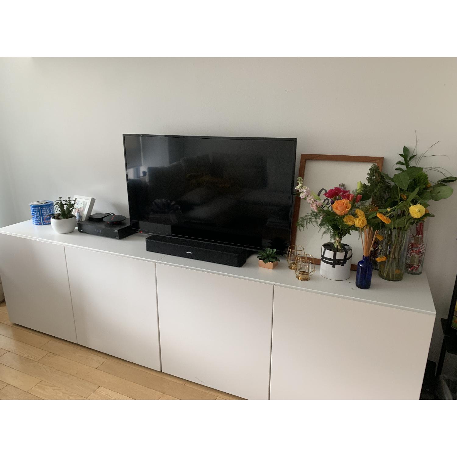 Ikea Besta Double w/ Shelves & Doors AptDeco