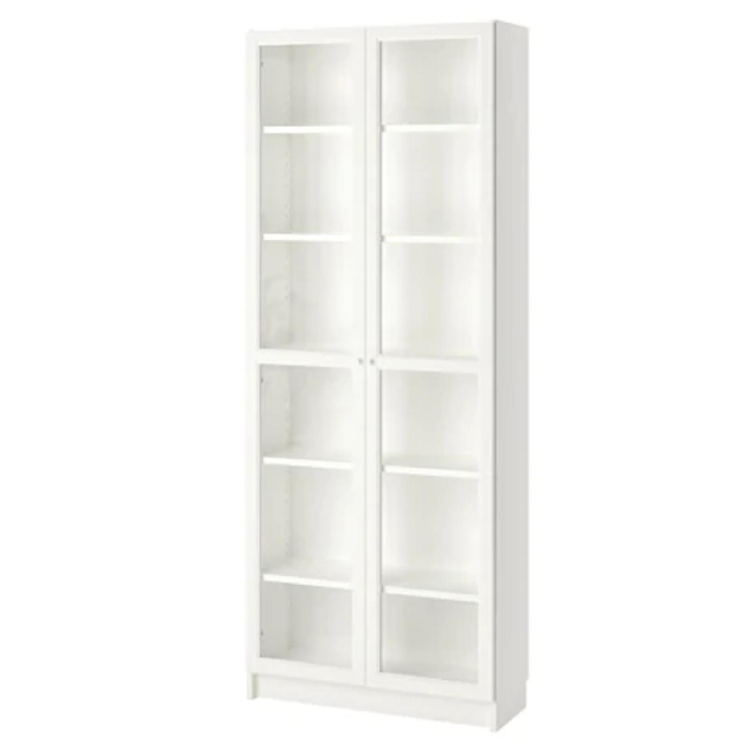 Ikea White Bookcase w/ Glass Door - image-0