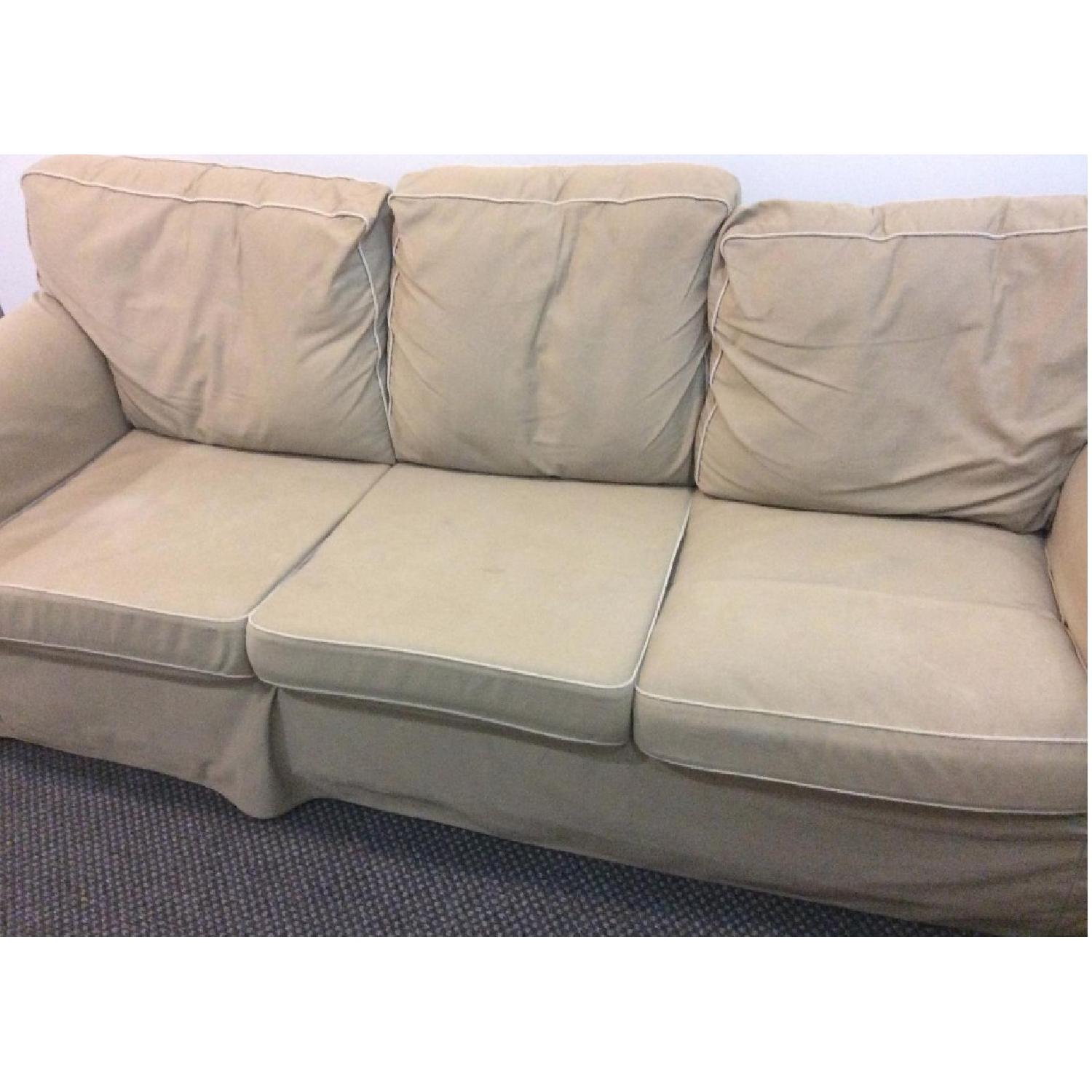 Beige Slipcovered Sofa - image-2