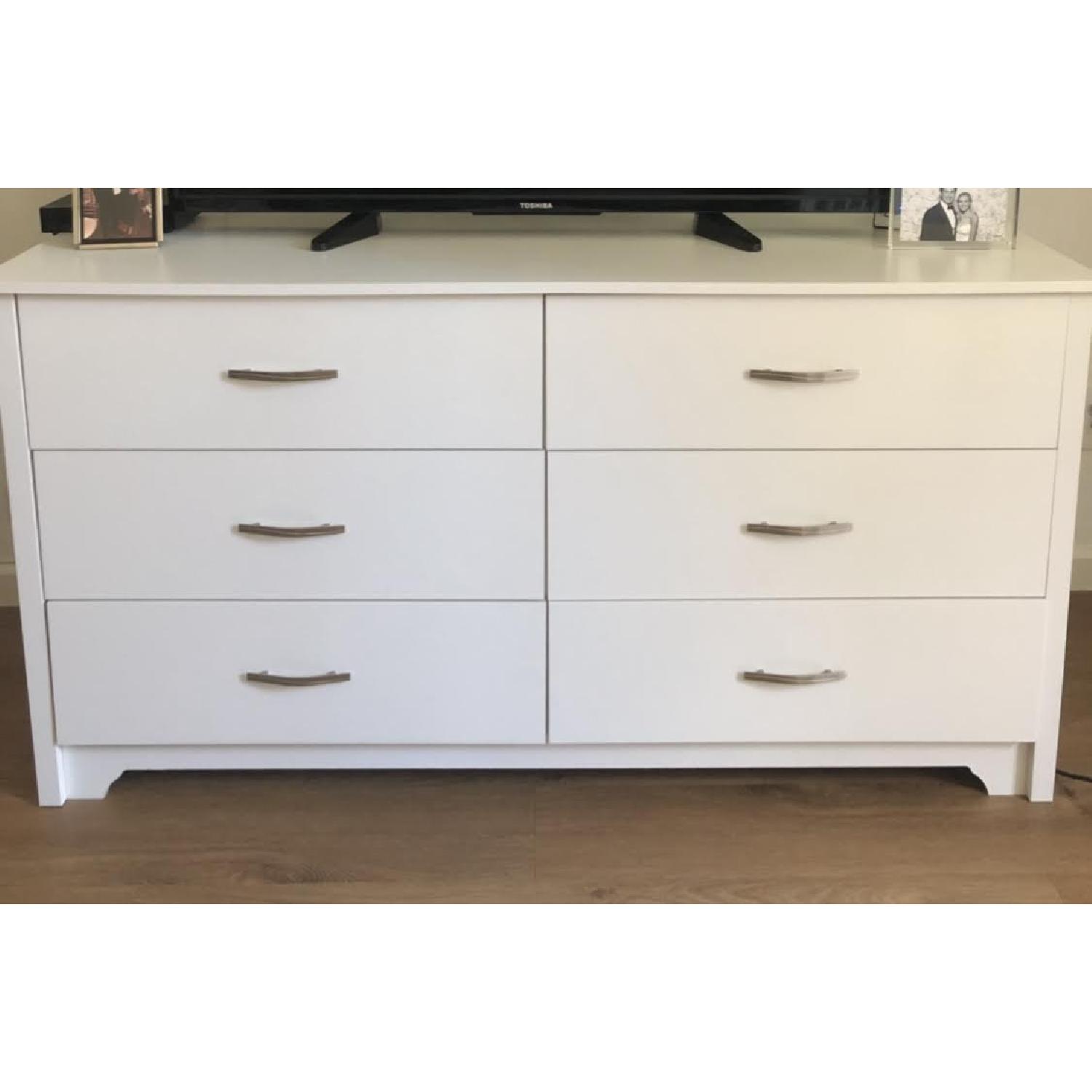 White Six Drawer Dresser w/ Silver Handles AptDeco