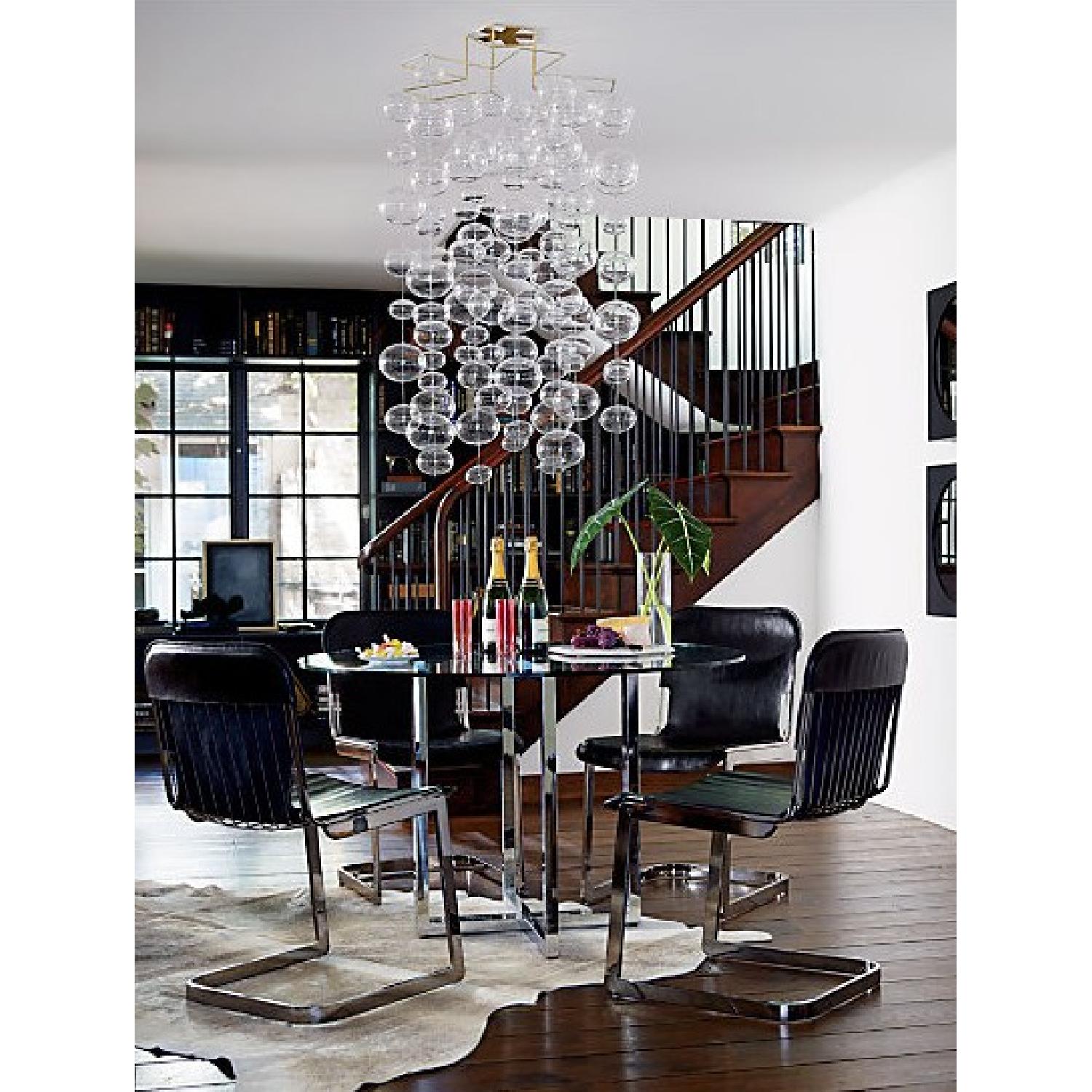 CB2 Glass Round Dining Table w/ Chrome Base AptDeco