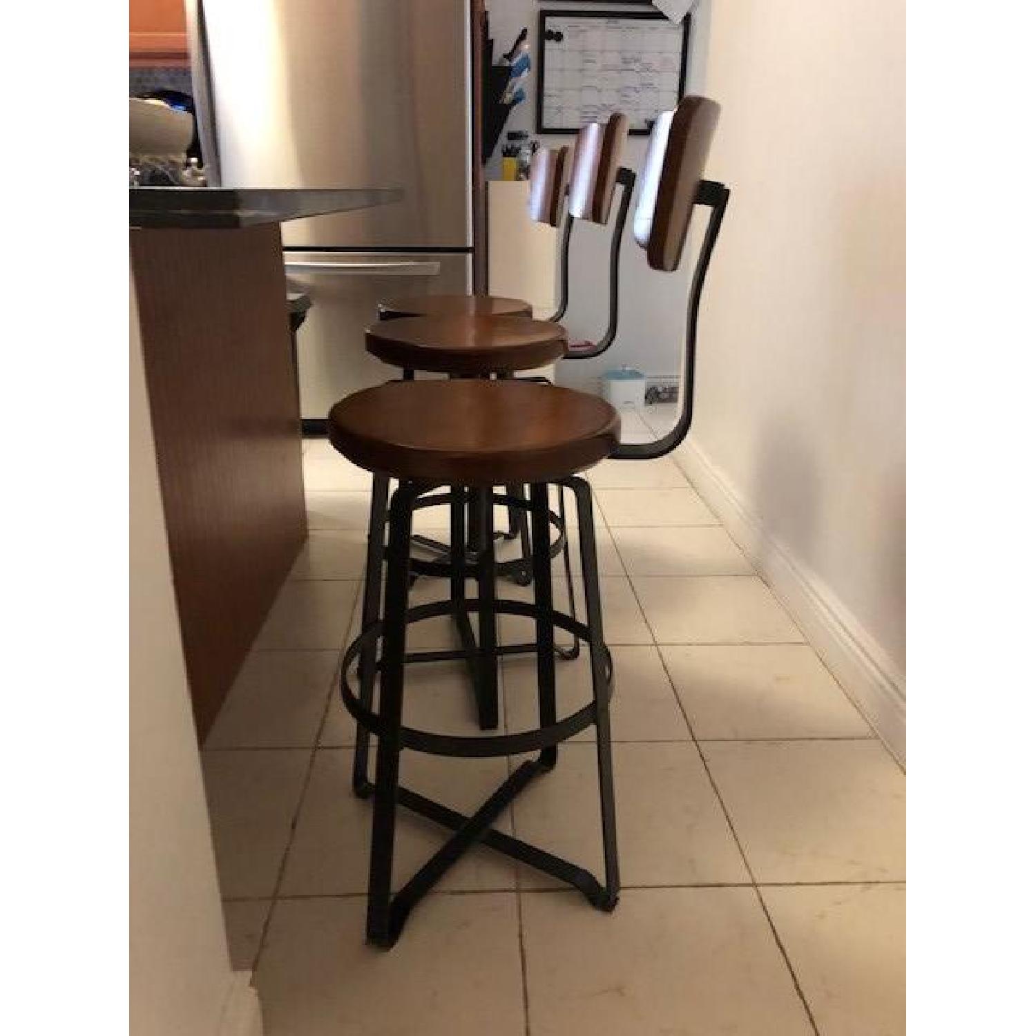 West Elm Adjustable Industrial Swivel Stools AptDeco