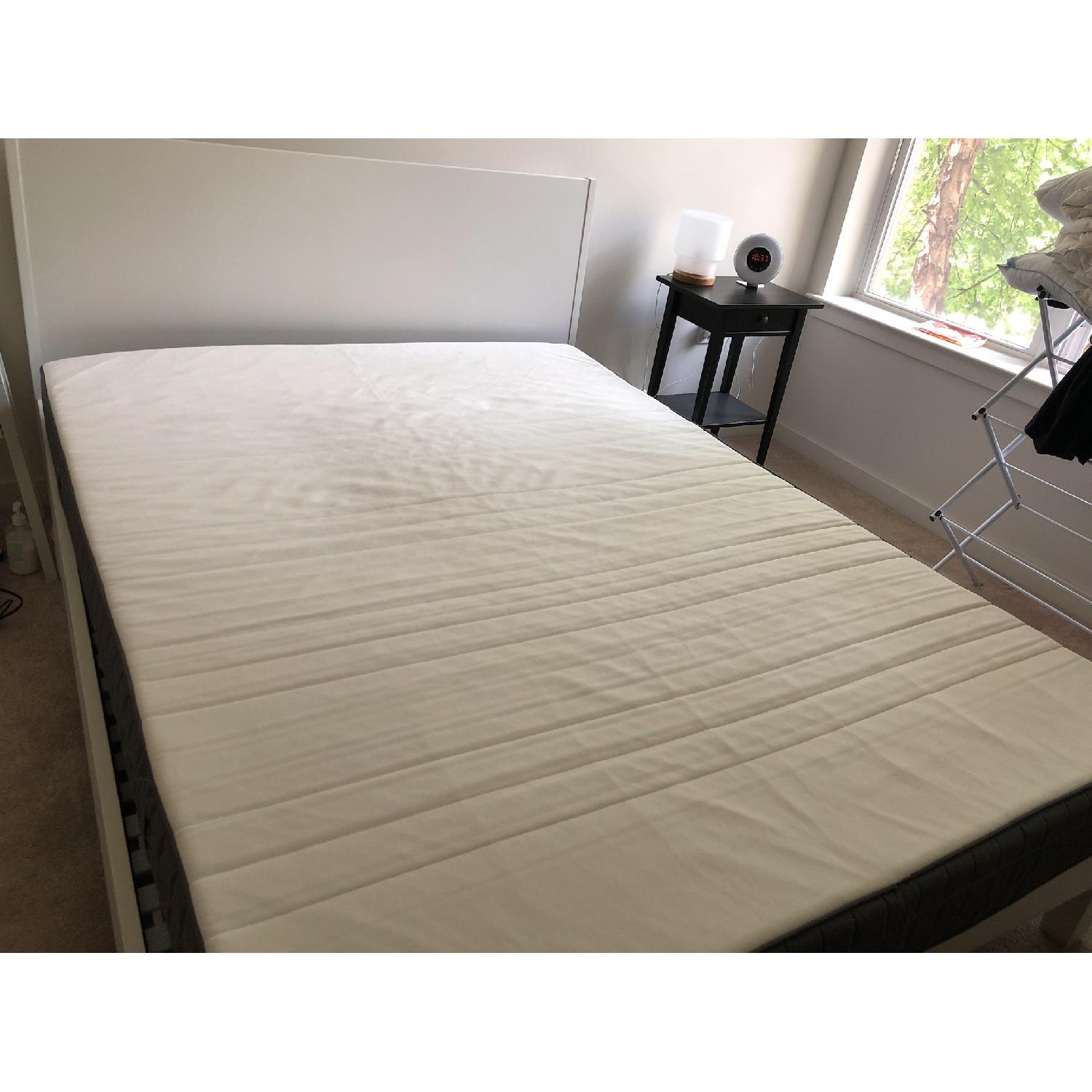 Ikea White Queen Bed Frame w/ Slated Base AptDeco