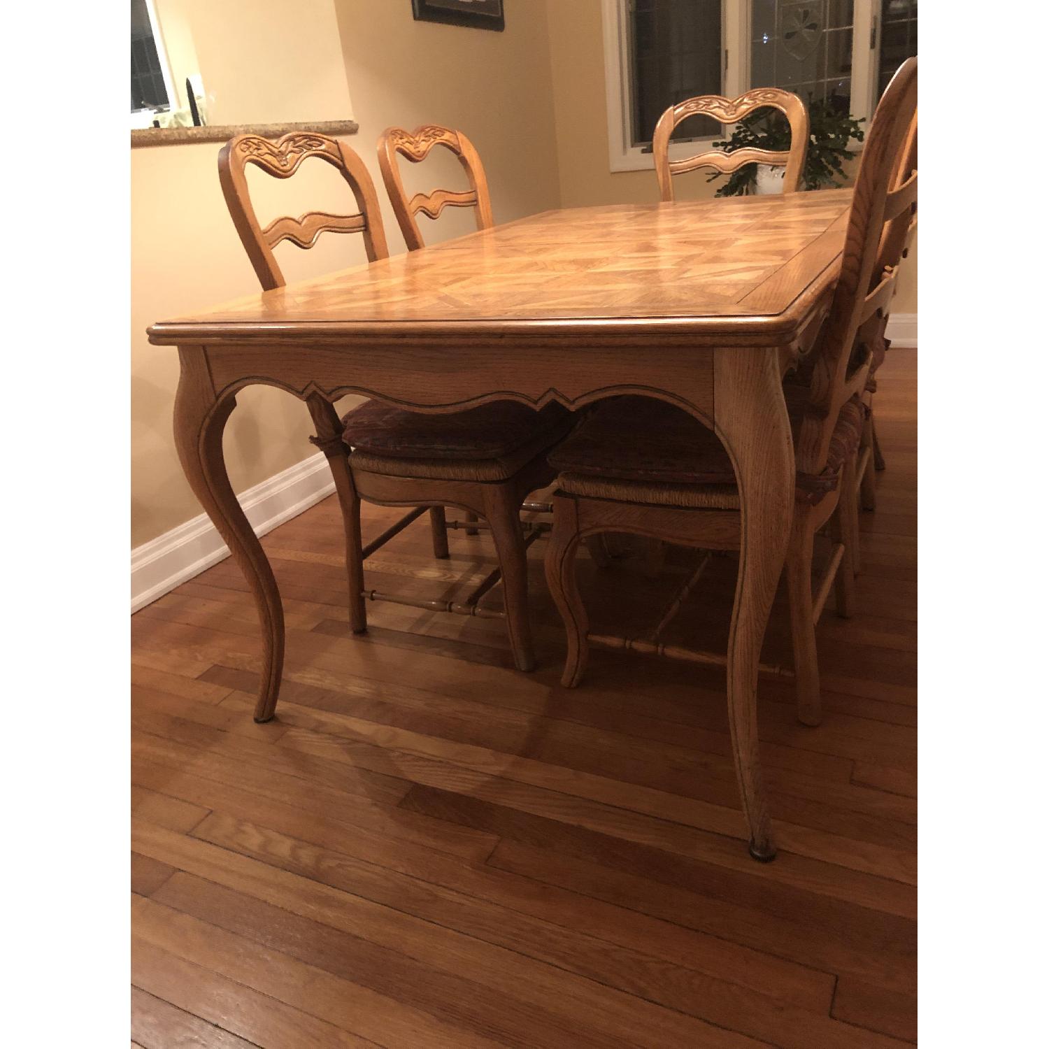Provence Expandable Dining Table w/ 8 Chairs - AptDeco