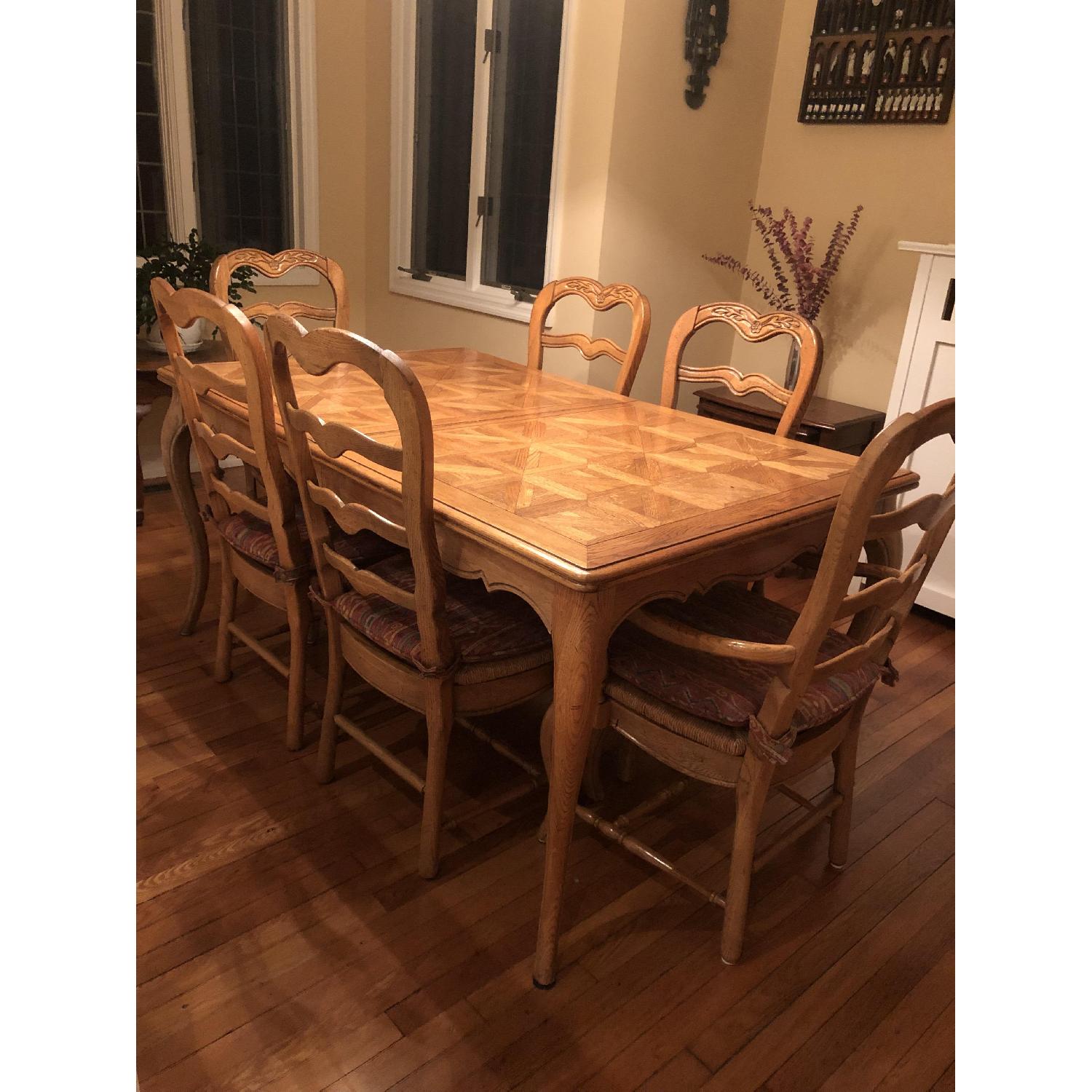 Provence Expandable Dining Table w/ 8 Chairs - AptDeco