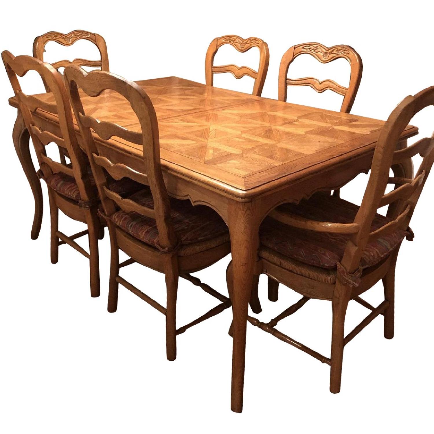 Provence Expandable Dining Table w/ 8 Chairs - AptDeco