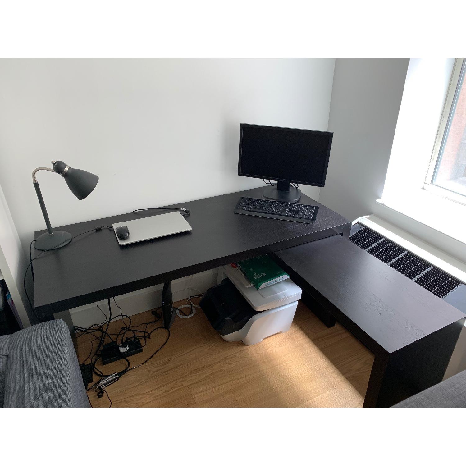 Ikea Black Corner Desk w/ Adjustable Panel AptDeco