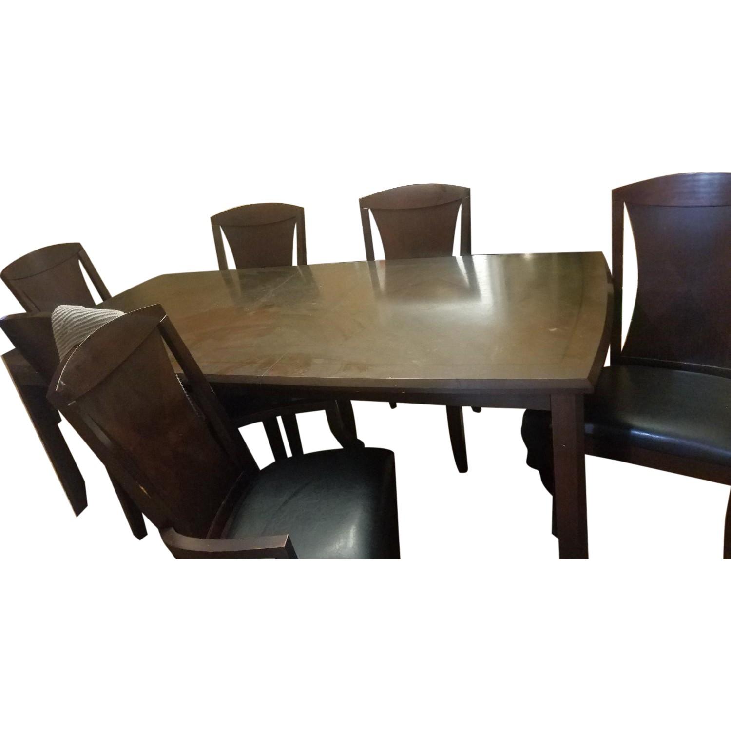 Raymour & Flanigan Wood Dining Table w/ 6 Leather Chairs AptDeco
