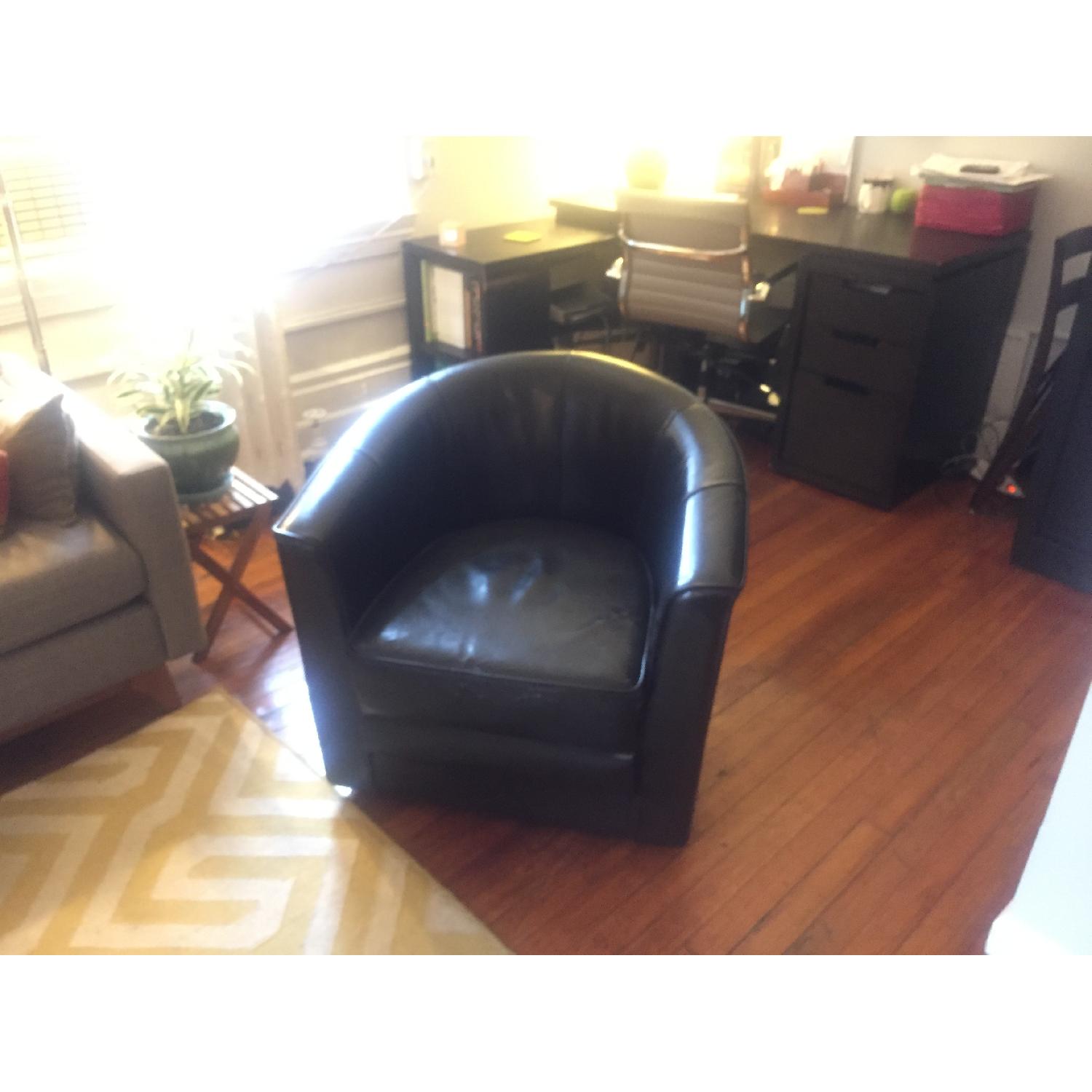 Raymour & Flanigan Leather Swivel Chair AptDeco