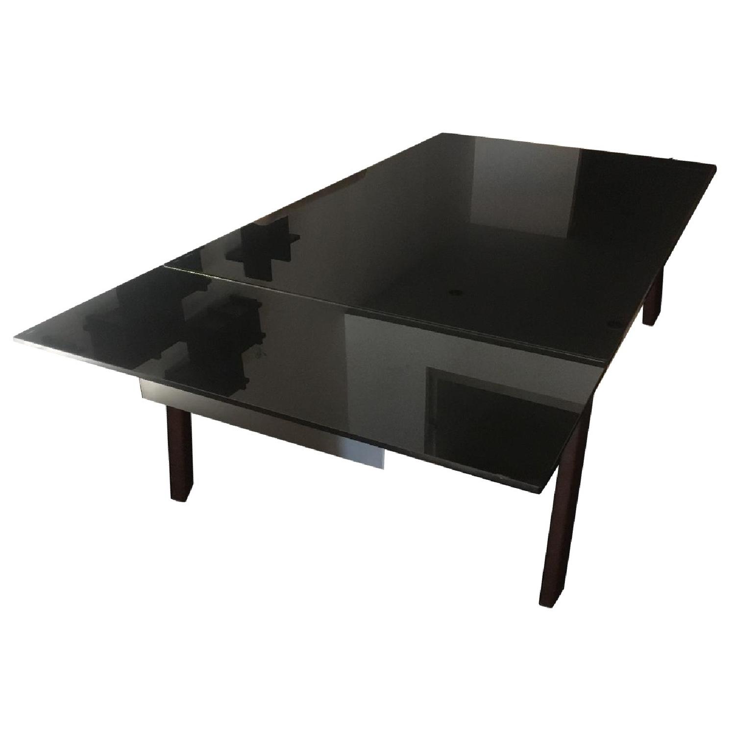 Expandable Black Tempered Glass Dining Table AptDeco