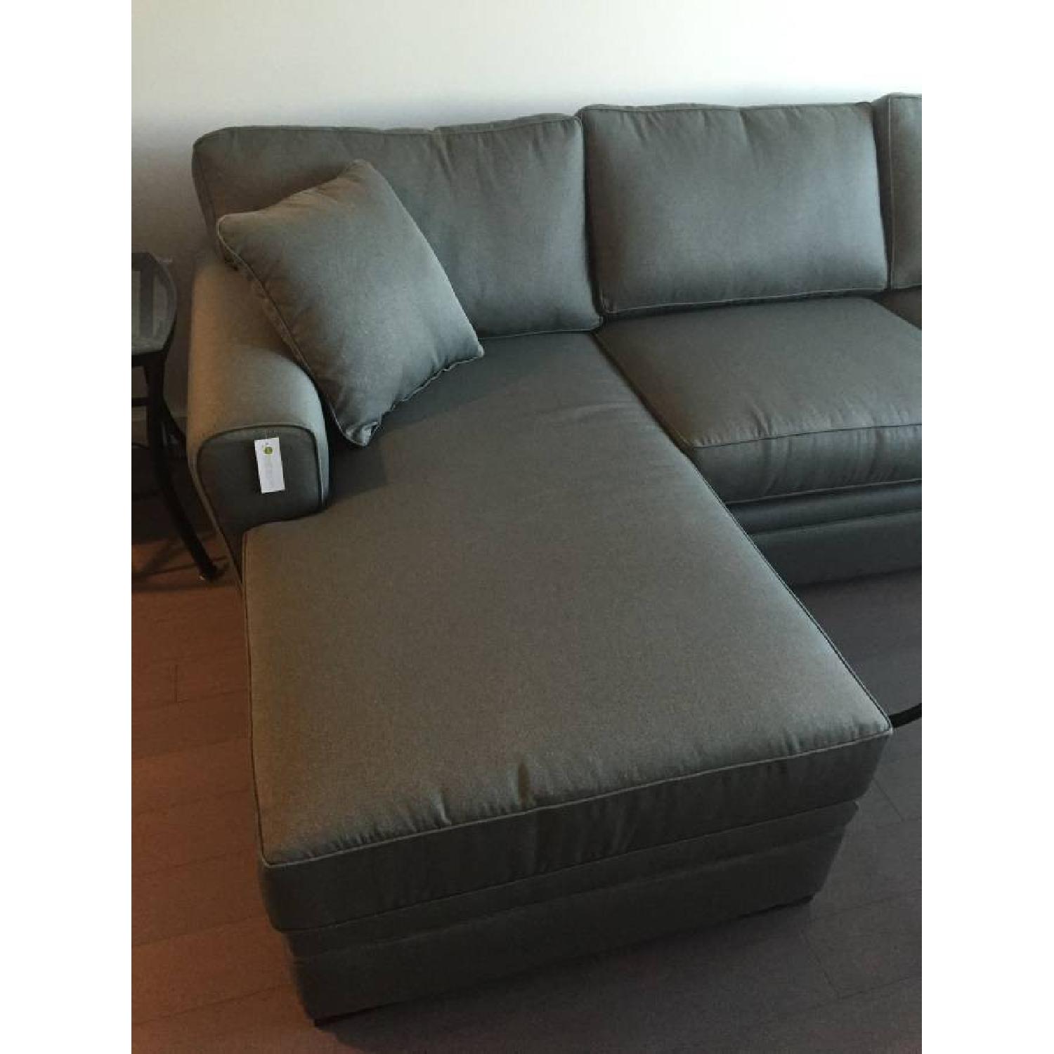 Raymour & Flanigan Chaise Sectional Sleeper Sofa AptDeco