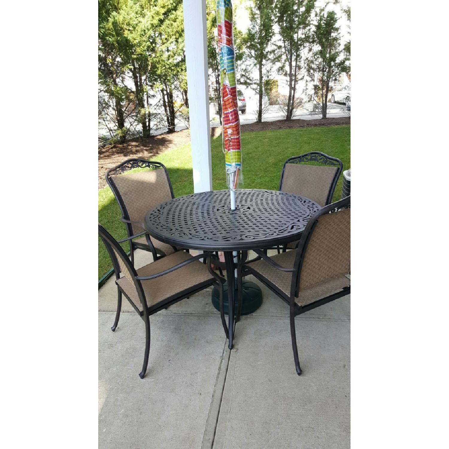 Beachmont Patio Round Table w/ 4 Chairs + Umbrella & Stand - image-3