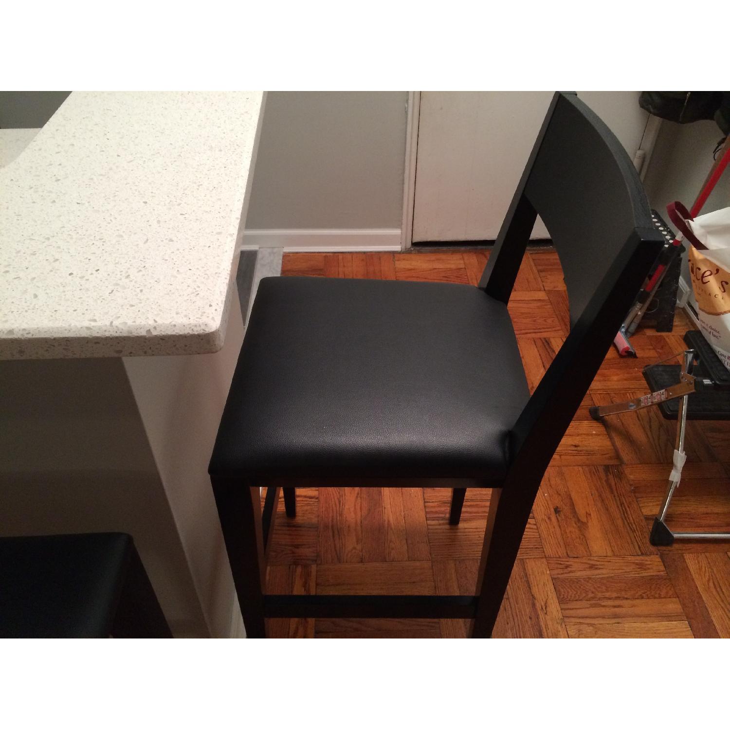 Crate & Barrel Black Leather Bar Stools Set of 2 AptDeco