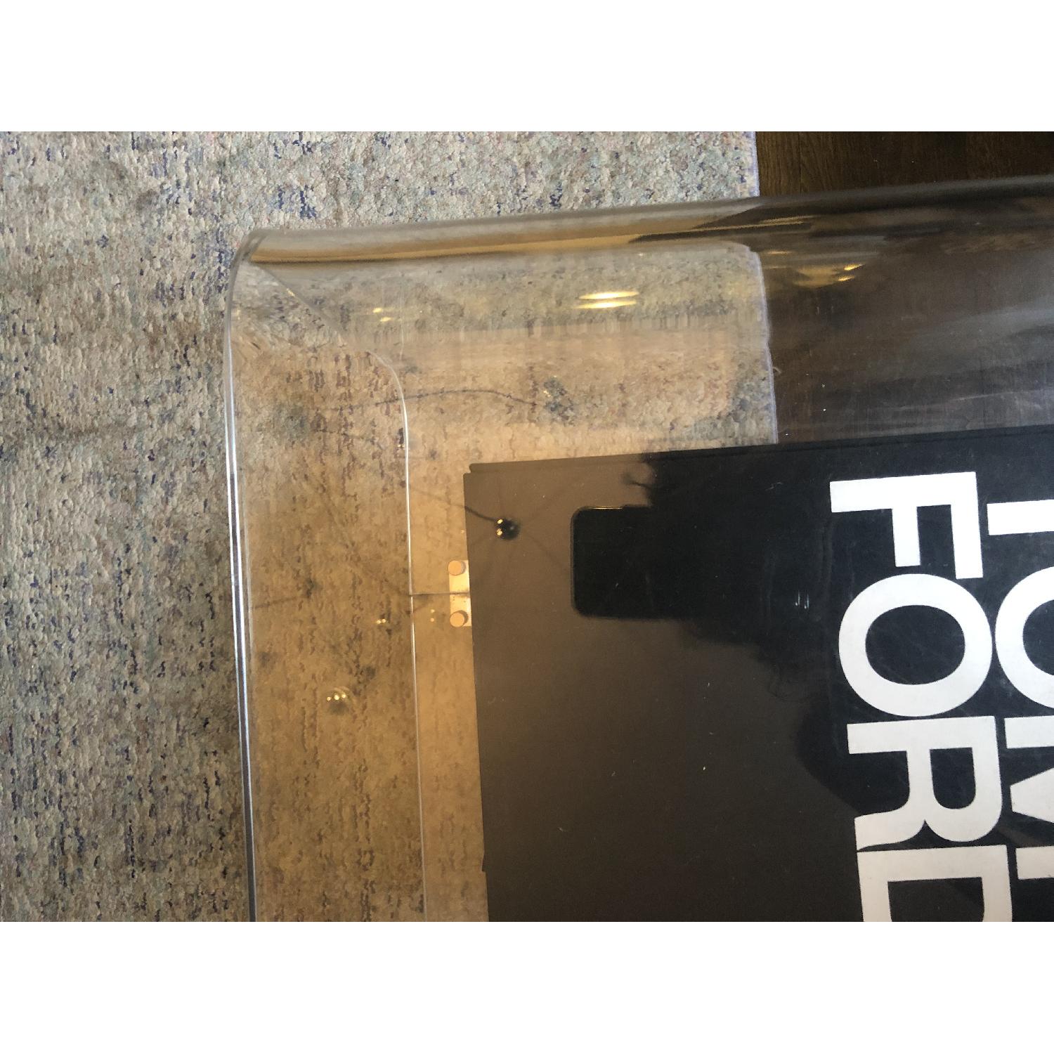 CB2 Acrylic Rolling Coffee Table AptDeco