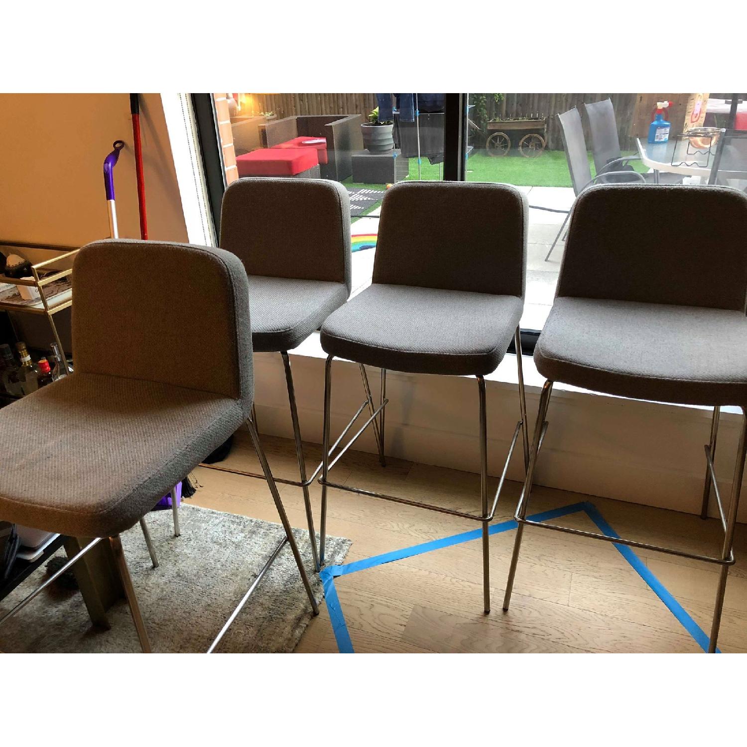 CB2 Charlie Bar Height Stools AptDeco