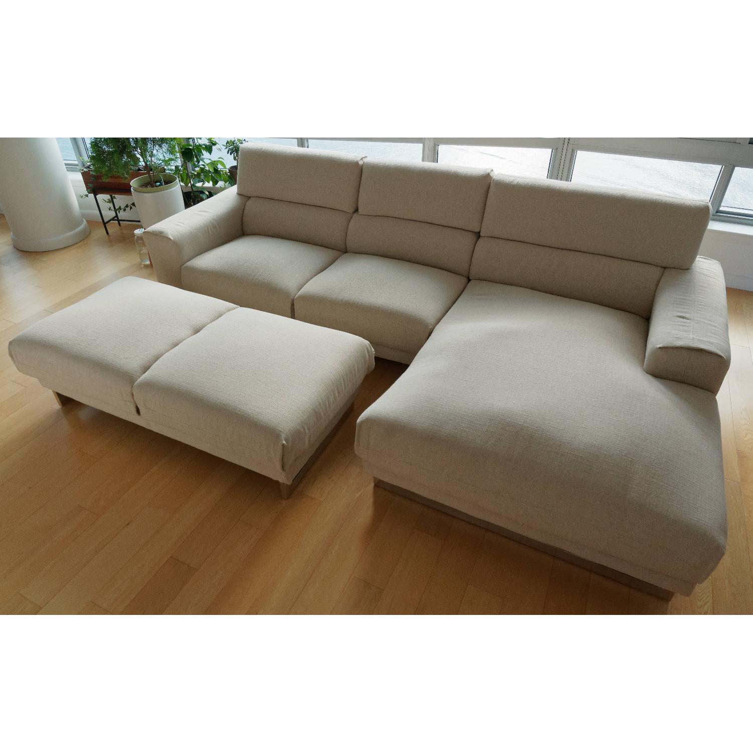 Jennifer Convertibles Chaise Sectional Sofa & Ottoman AptDeco
