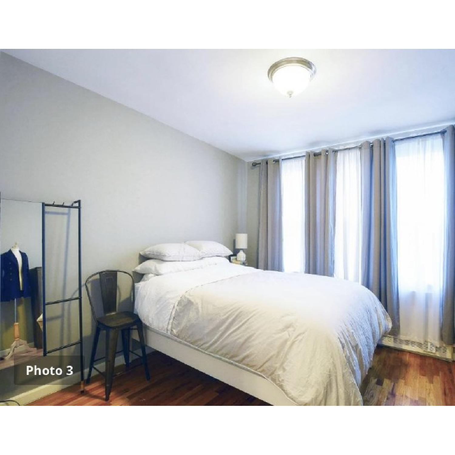 West Elm Simple Tall Bed Frame AptDeco