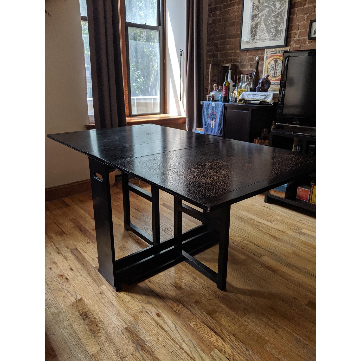 Crate & Barrel Black Span Gateleg Dining Table AptDeco