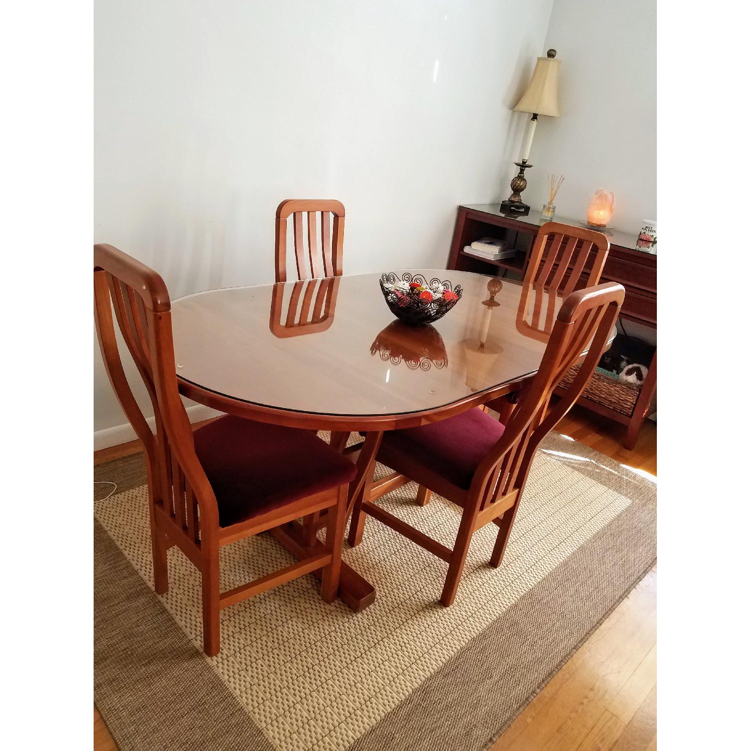 Cherry Wood Dining Table w/ 4 Burgundy Seat Chairs - AptDeco