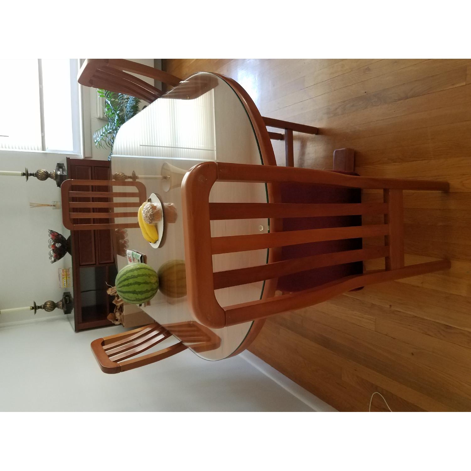 Cherry Wood Dining Table w/ 4 Burgundy Seat Chairs - AptDeco
