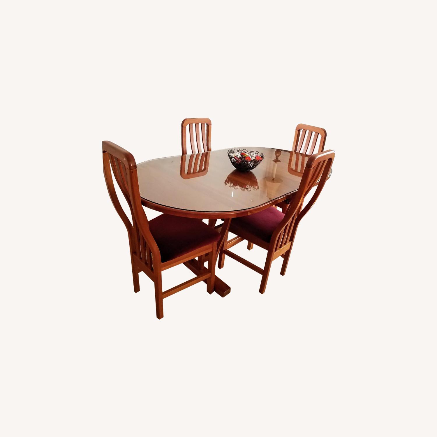 Cherry Wood Dining Table w/ 4 Burgundy Seat Chairs - AptDeco
