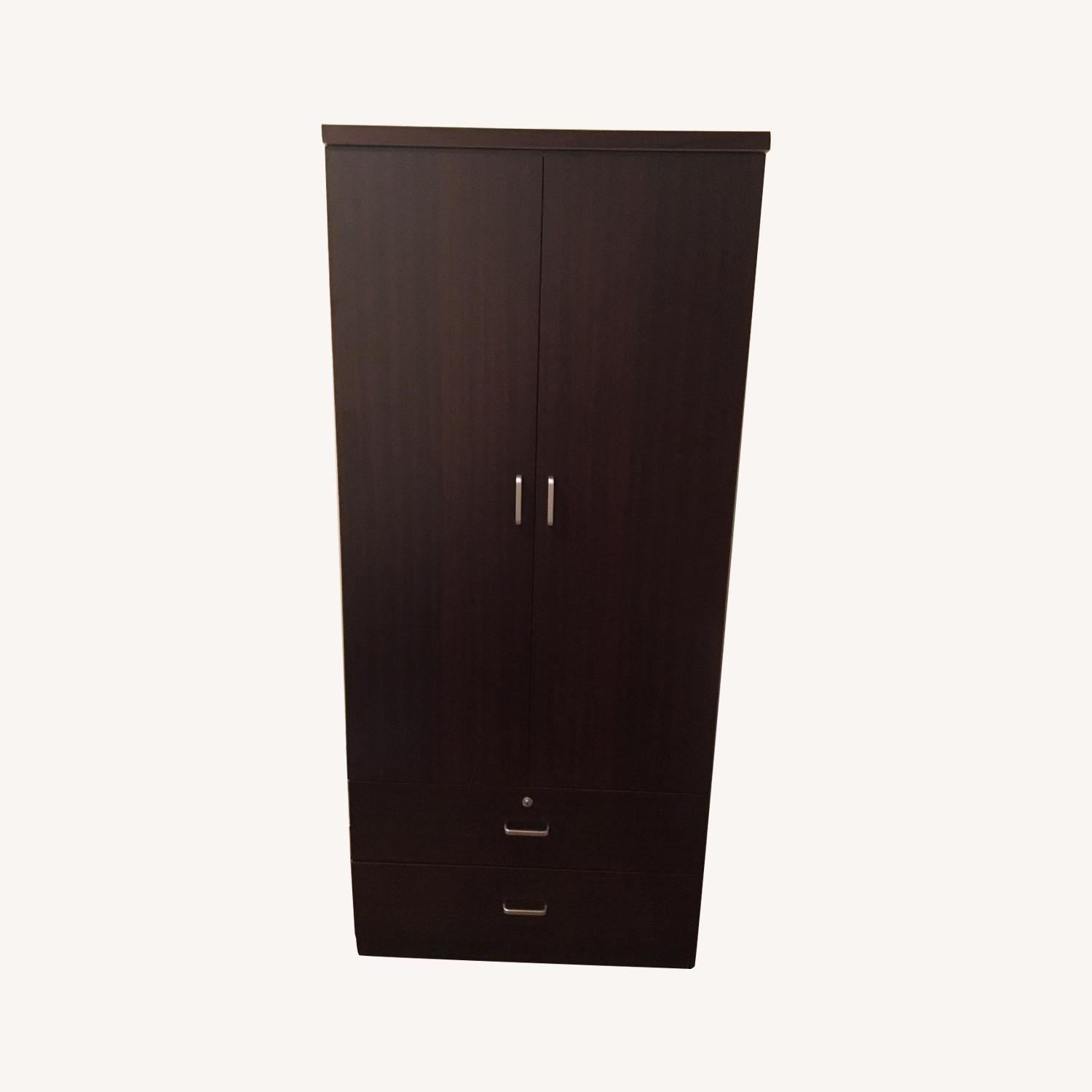 Brown Wardrobe/Armoire w/ Mirror Inside - image-0