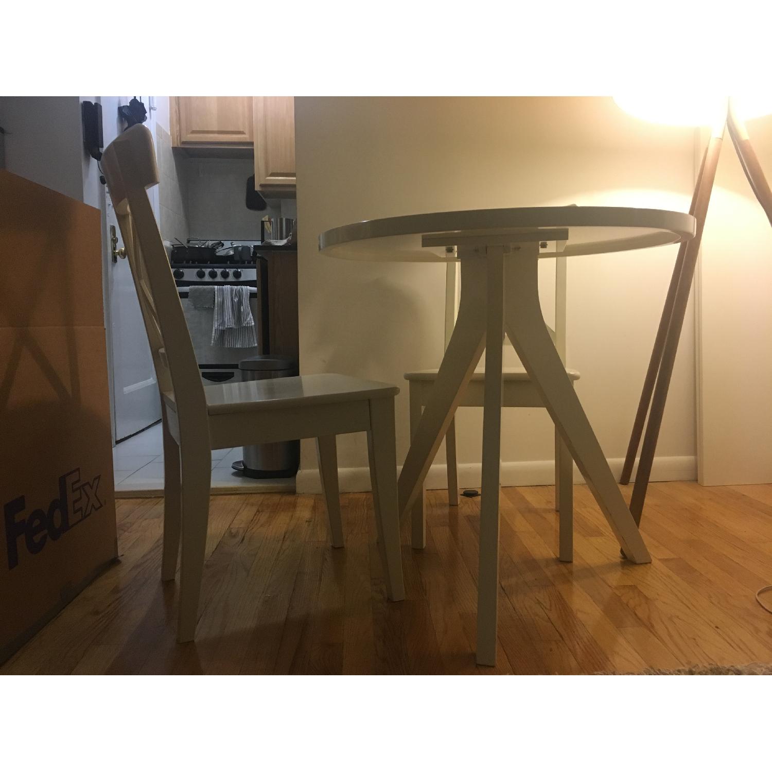 West Elm Tripod White Lacquer Dining Table AptDeco