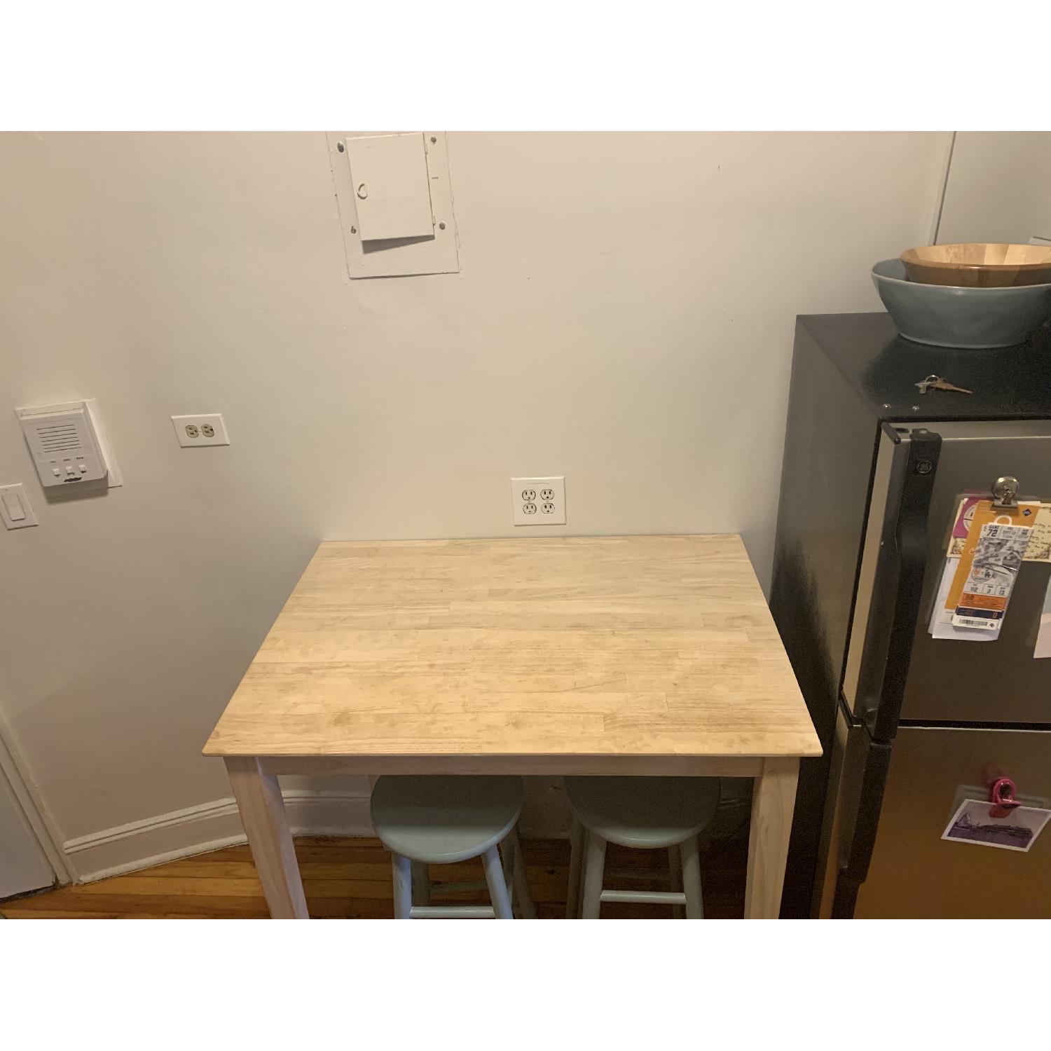 Light Wood Dining Table - image-1