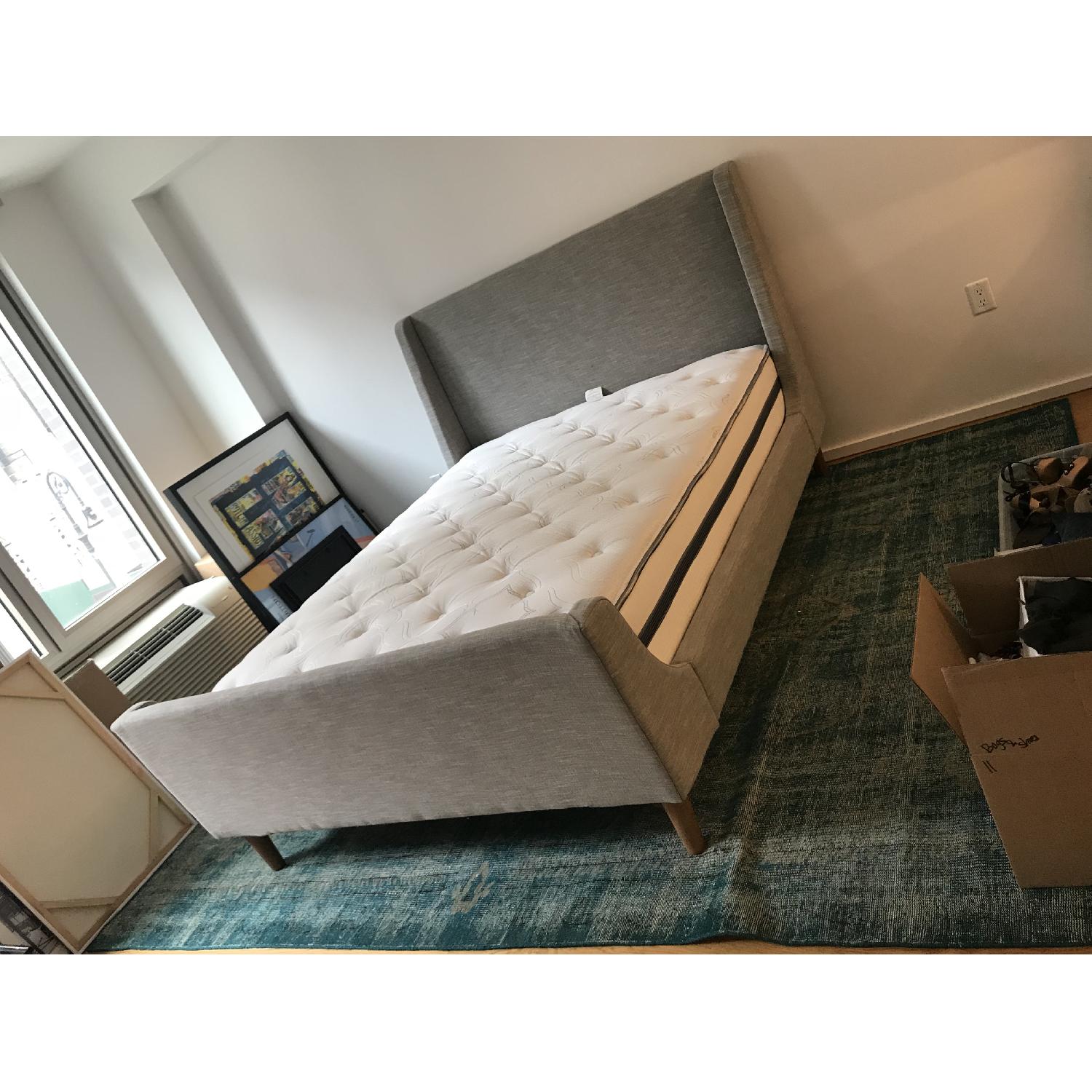 West Elm Upholstered Sleigh Bed - AptDeco