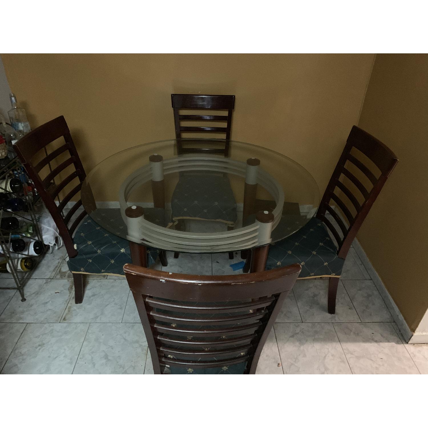 Round Glass Kitchen table w/ 5 Chairs - image-1