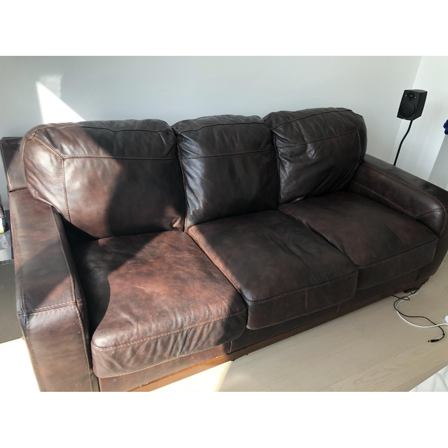 Ashley Crestwood Brown Leather Sofa - image-1