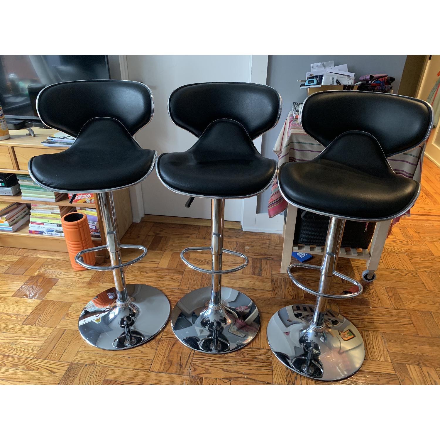 Black leather w/ chrome accents barstools - image-4