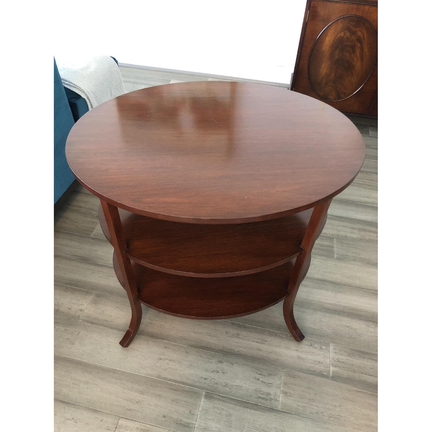 Oval solid wood side table with 2 shelves - image-1