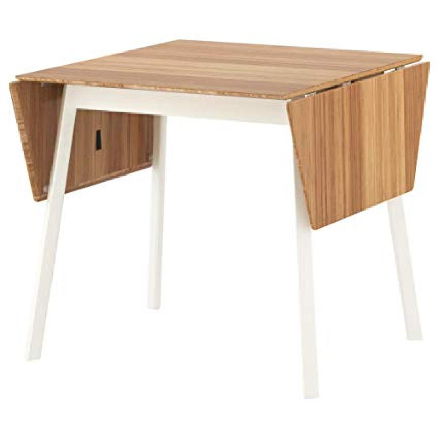 Ikea Dining Table w/ 4 Chairs - image-0