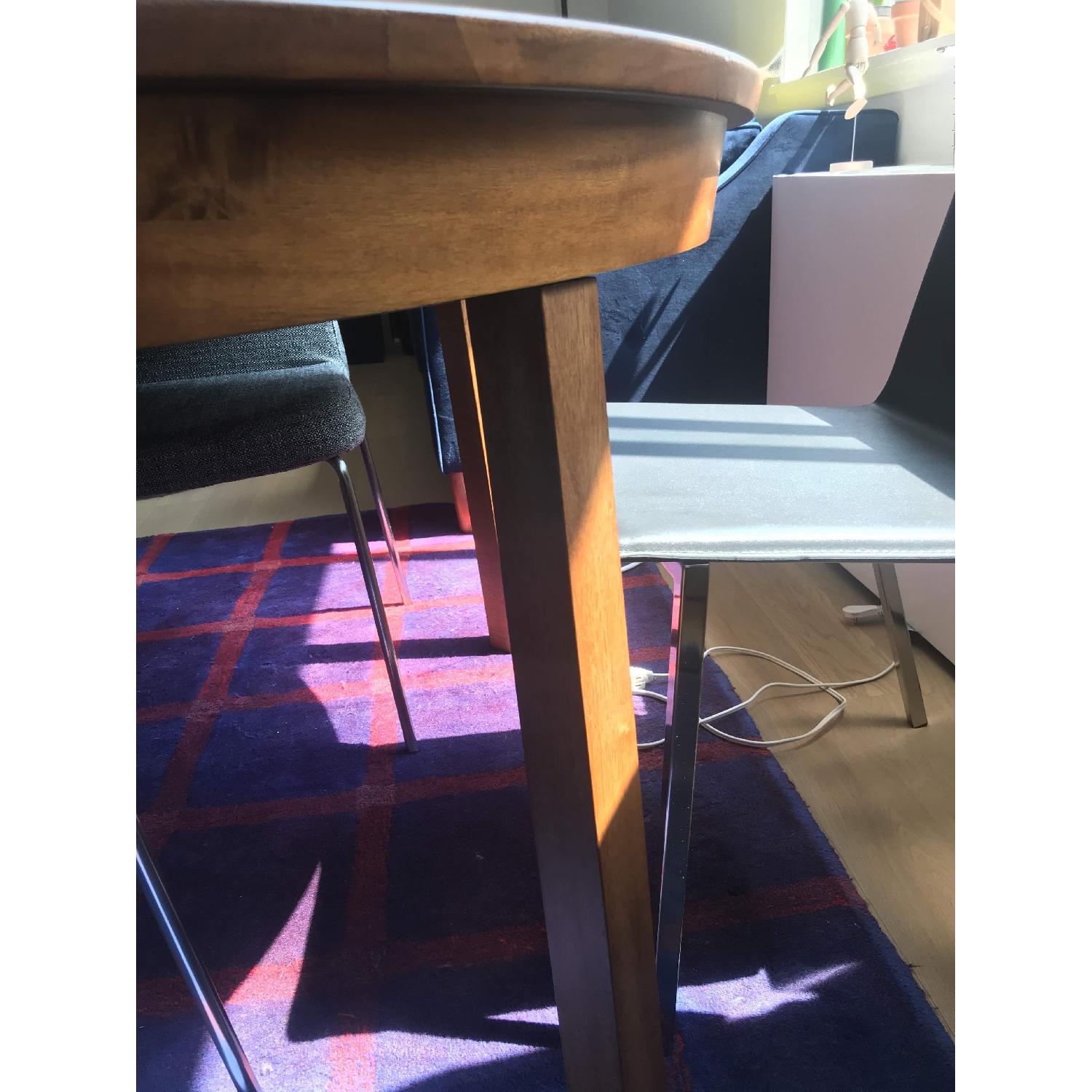 CB2 Round Wood Dining Table AptDeco