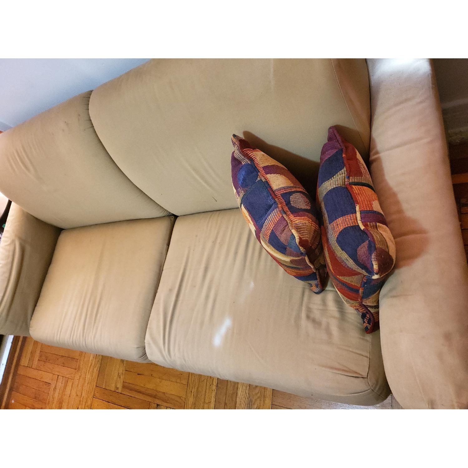 Beige Slipcovered Sofa - image-1