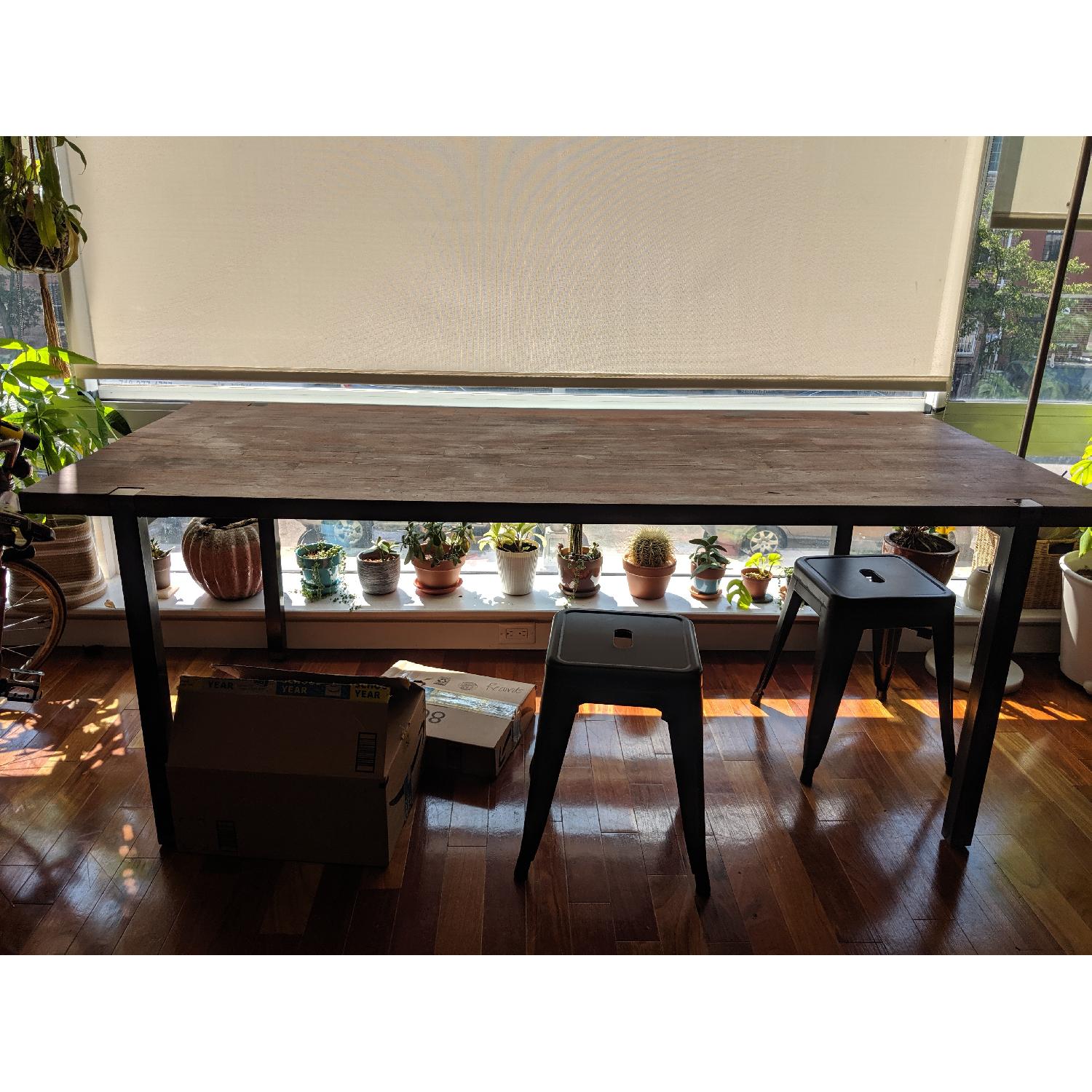 West Elm Solid Mahogany Industrial Dining Table AptDeco