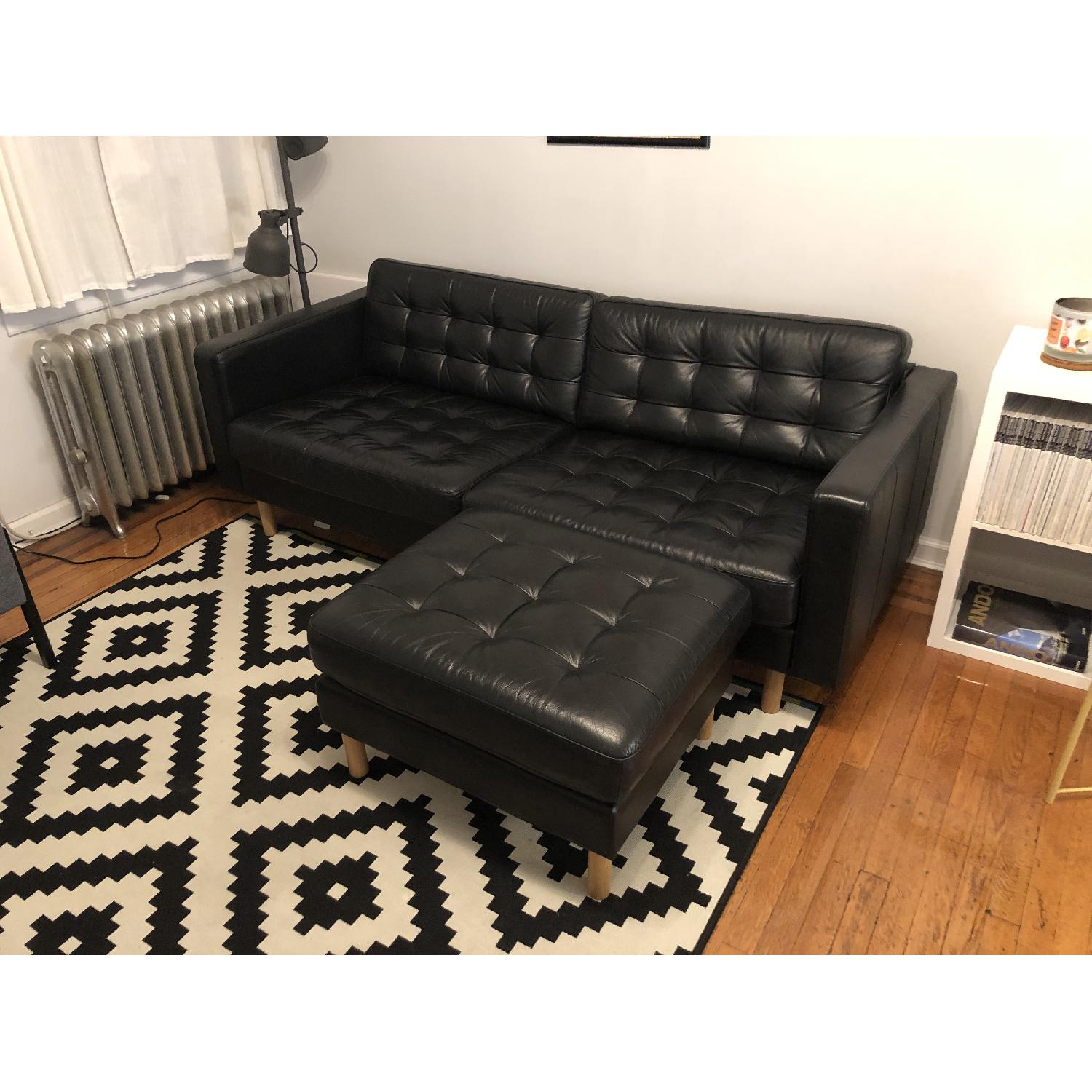 Ikea Black Leather Sofa & Ottoman - image-1