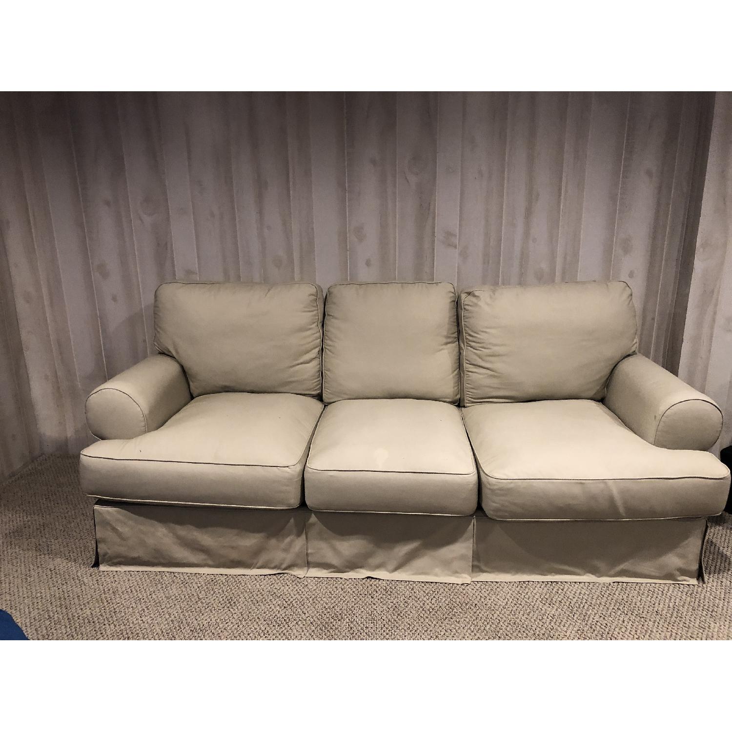 Ashley Beige Slipcovered Sofa - image-1