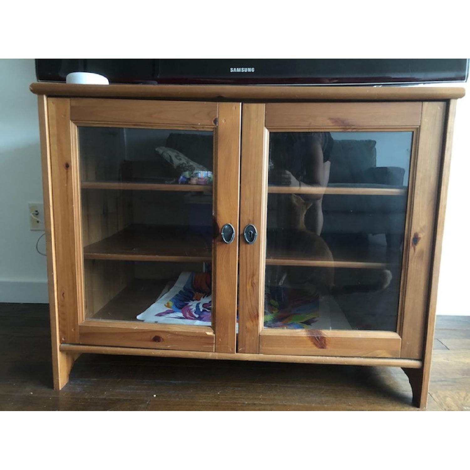 Wood TV Stand w/ Glass Doors - image-1