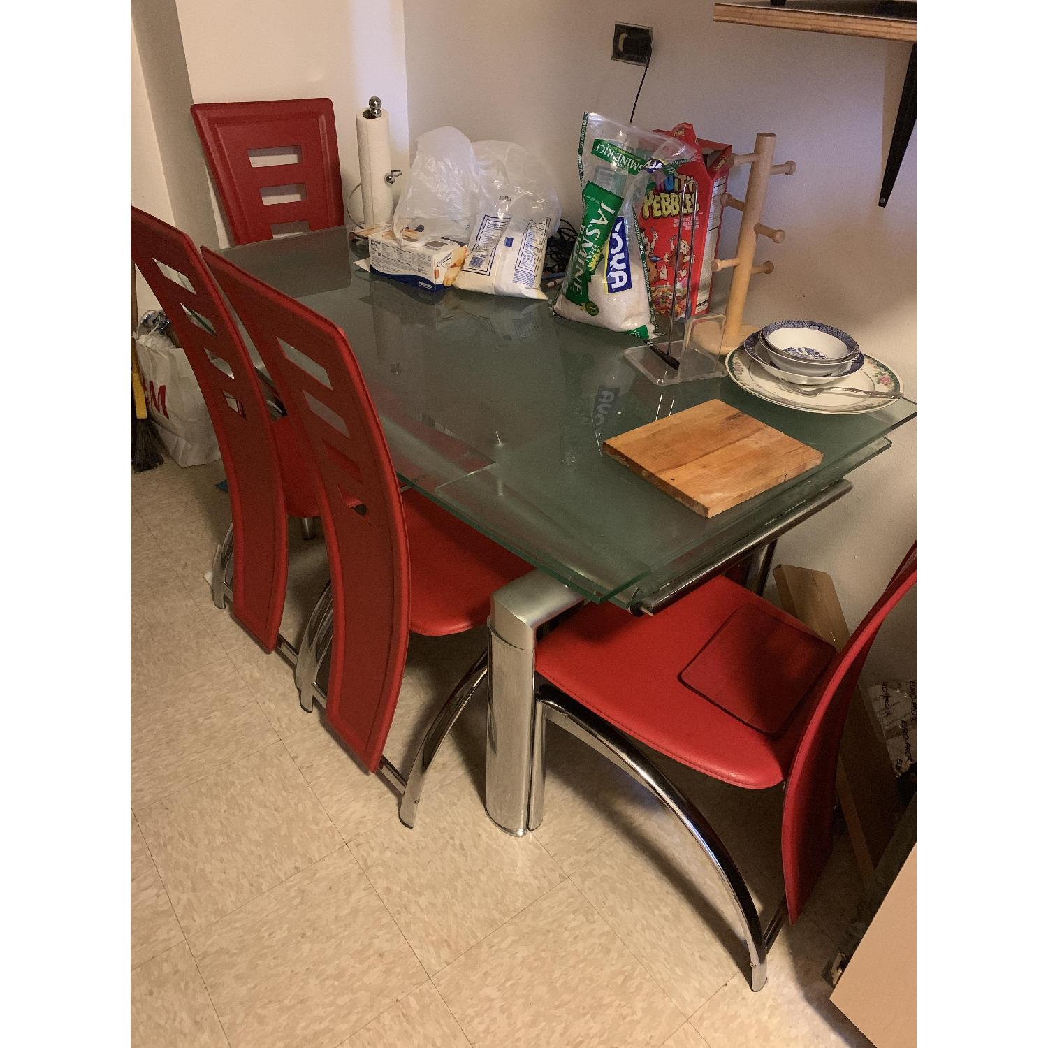 Glass Dining Table w/ 4 Red Chairs - image-1