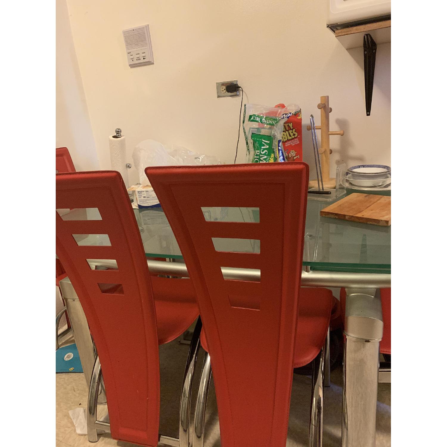 Glass Dining Table w/ 4 Red Chairs - image-3