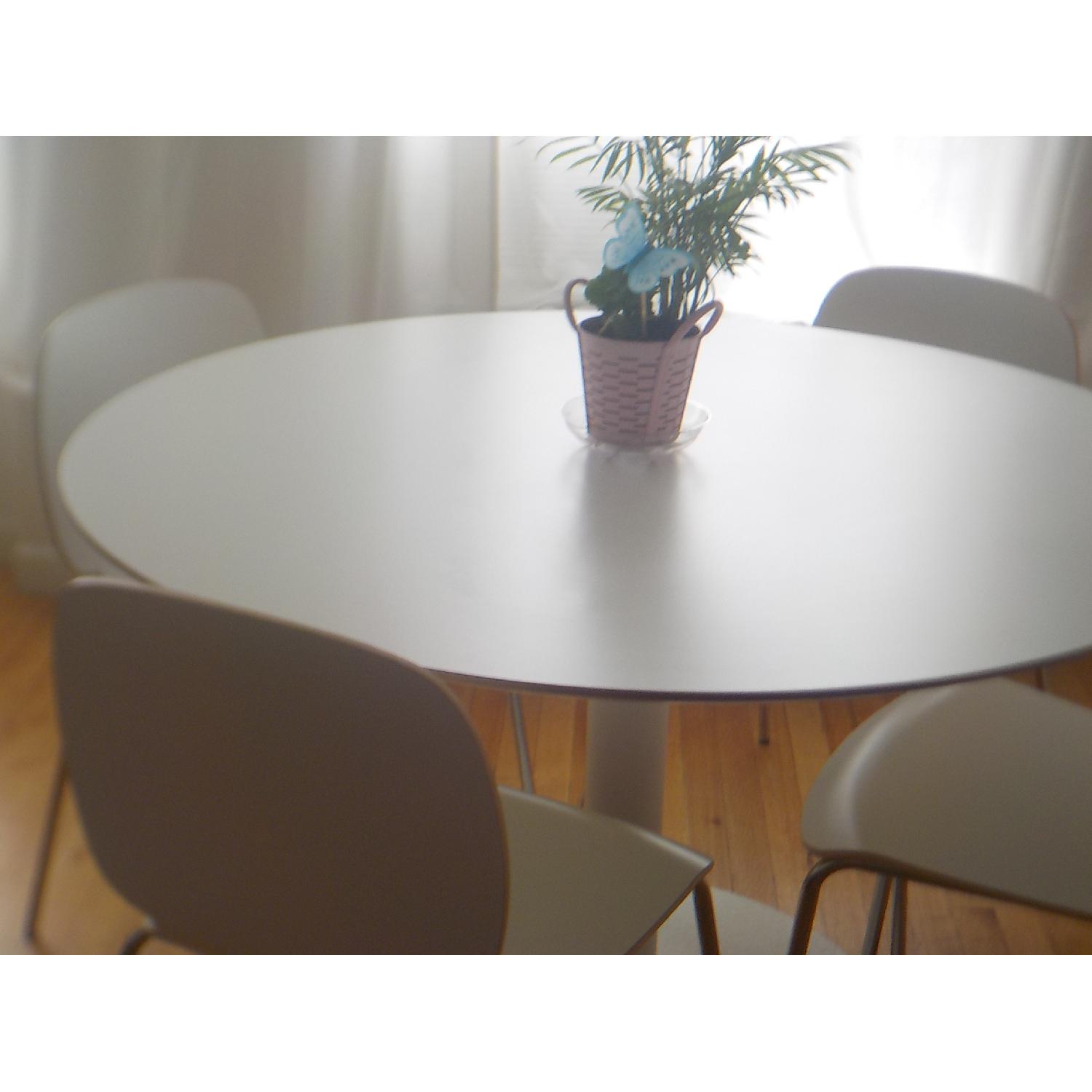 Ikea White Dining Table w/ 4 Chairs AptDeco