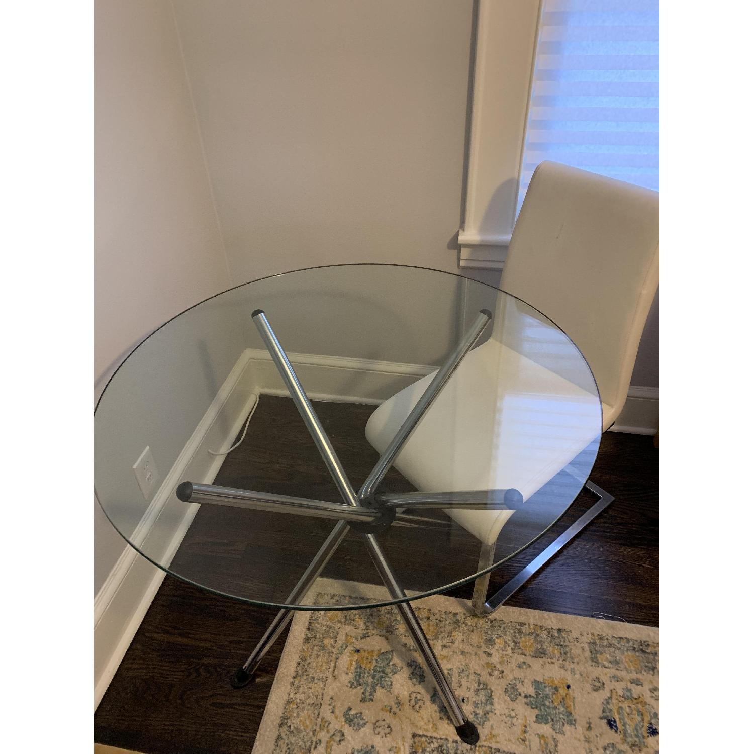 Euro Style Glass Dining Table w/ 2 Leather Dining Chairs - AptDeco