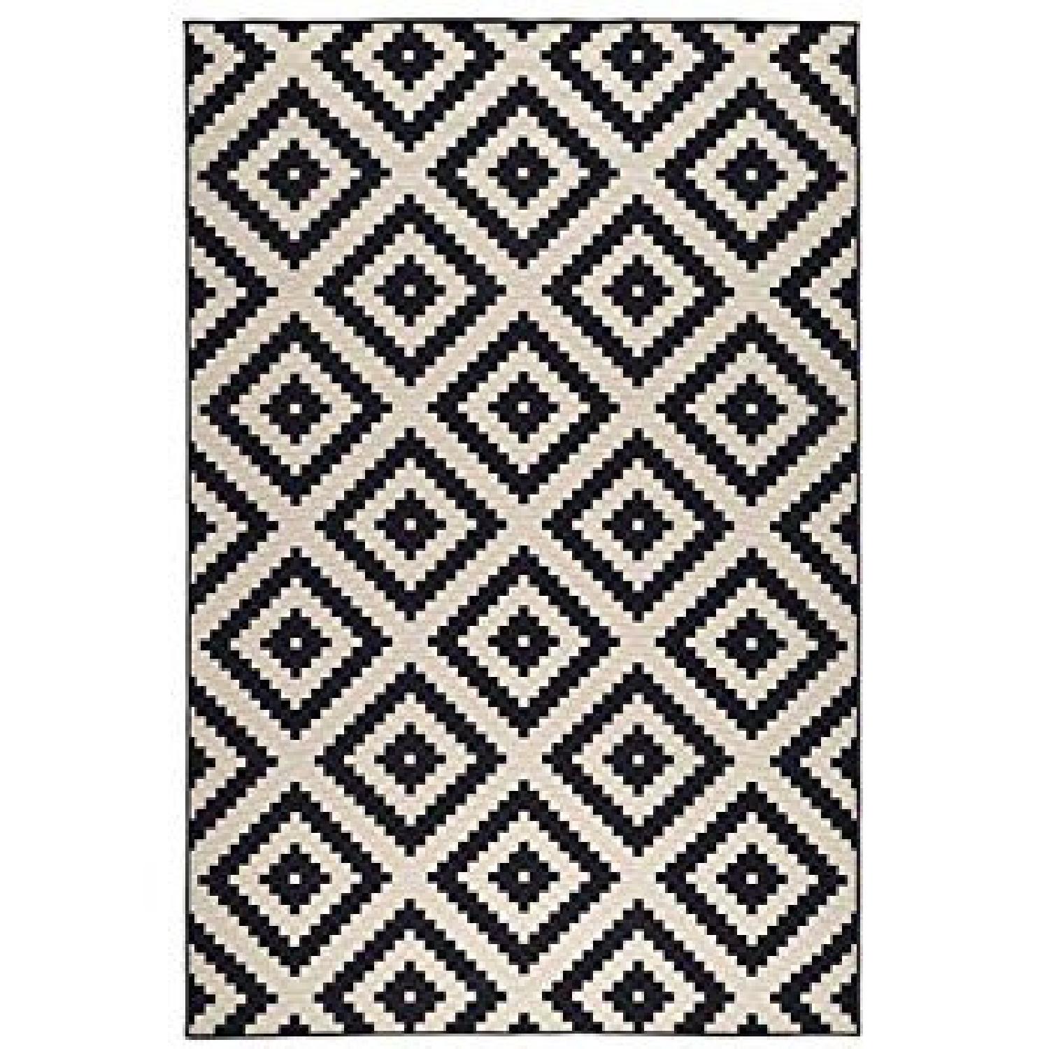 Ikea Black Patterned Area Rug - AptDeco