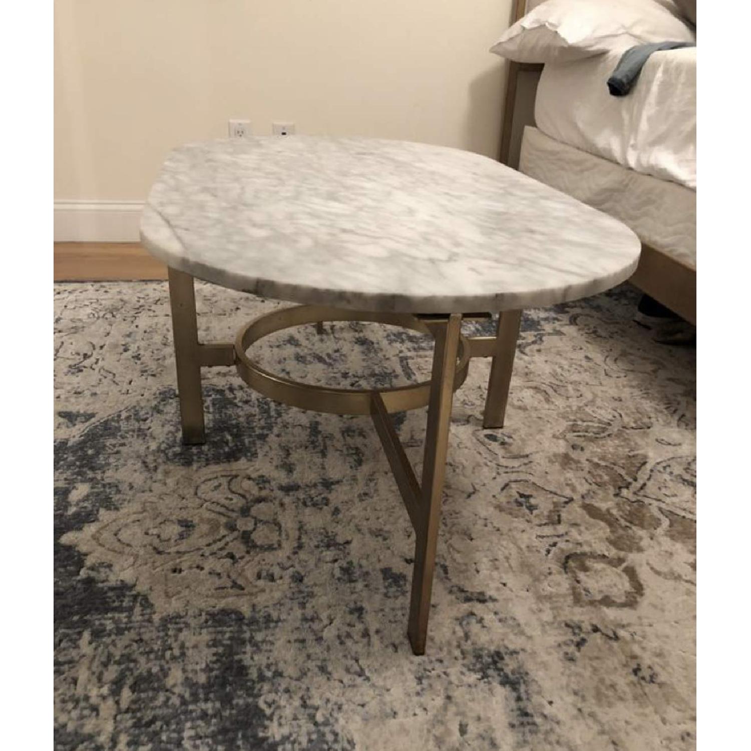 West Elm Marble Oval Coffee Table AptDeco