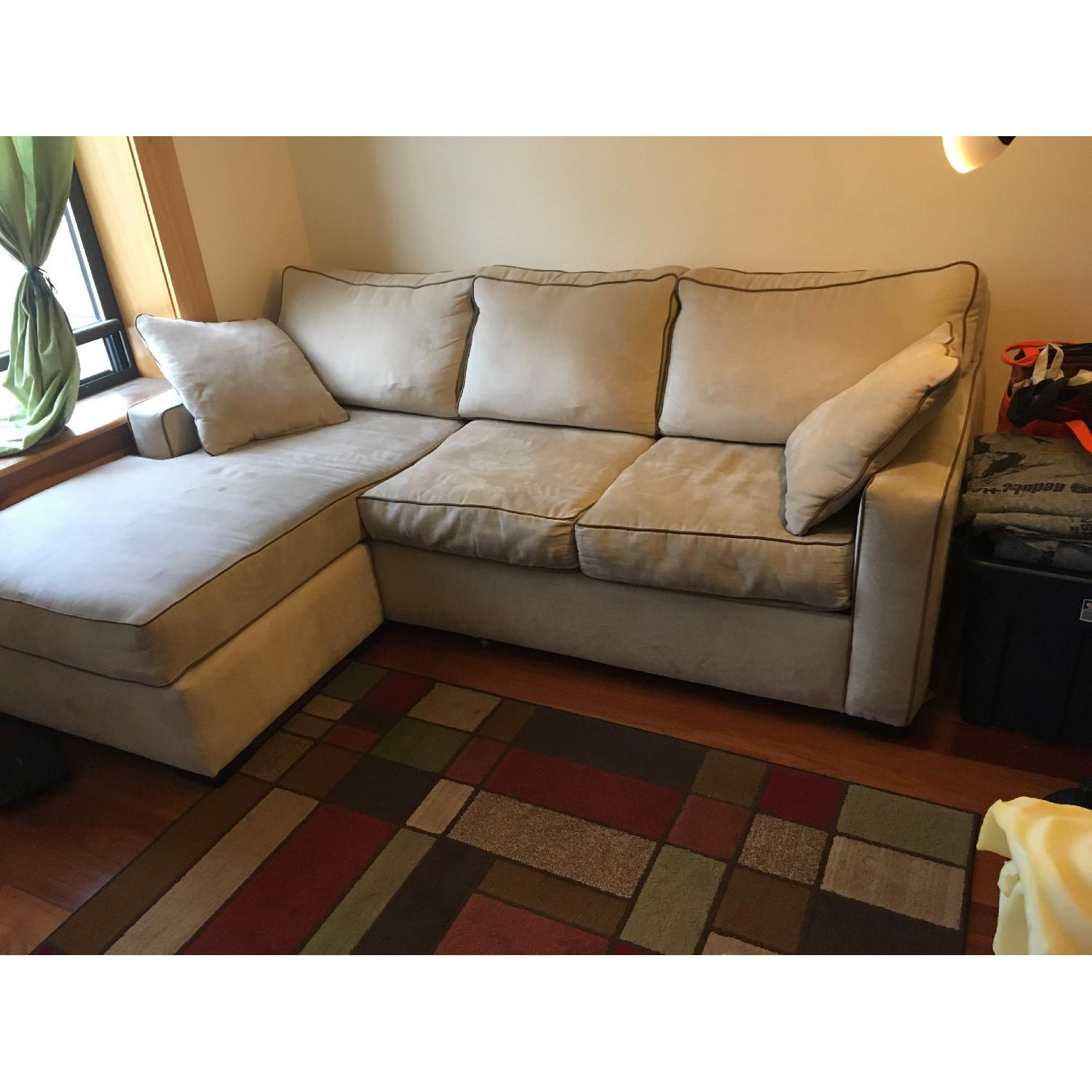 Jennifer Convertibles Reversible Sleeper Sectional Sofa - image-1