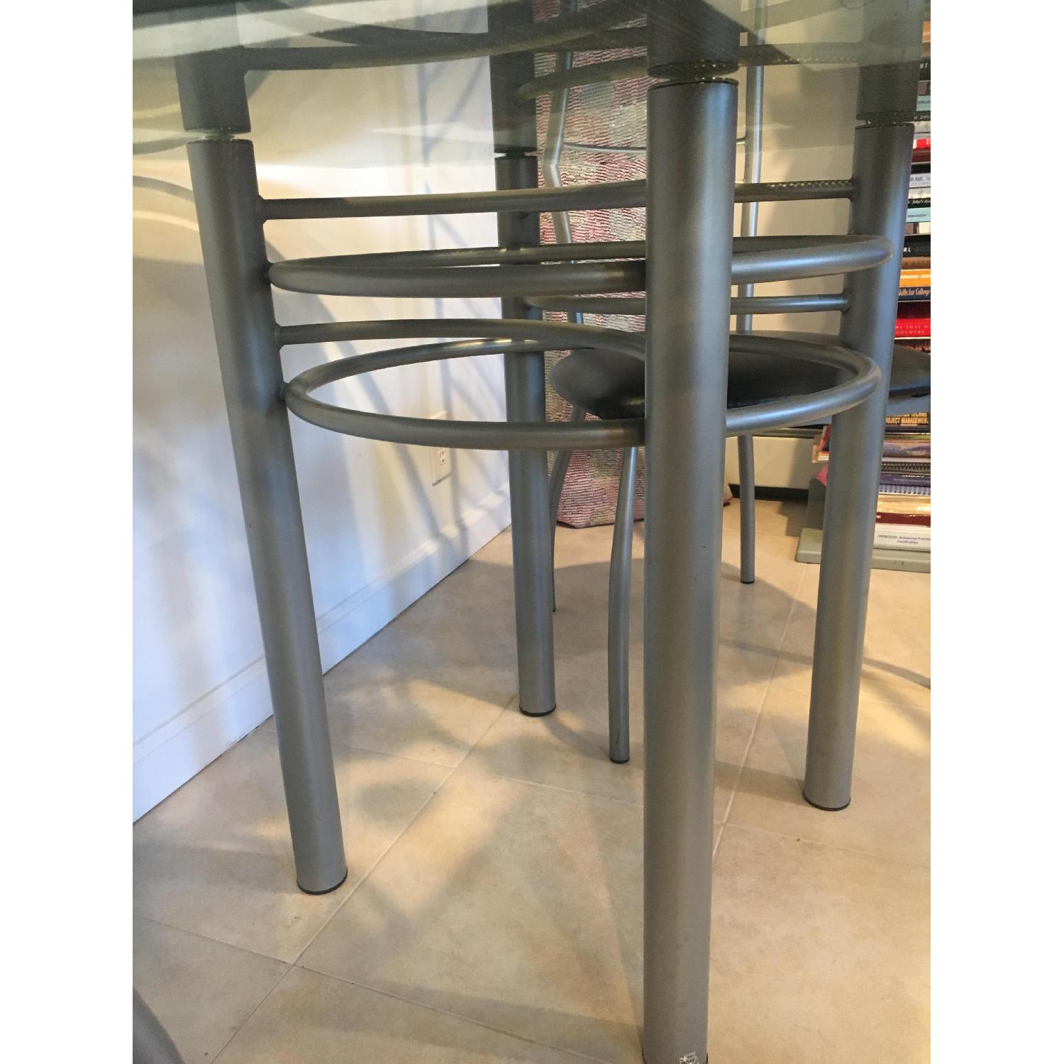 Amisco Glass Dining Table w/ 4 Chairs AptDeco