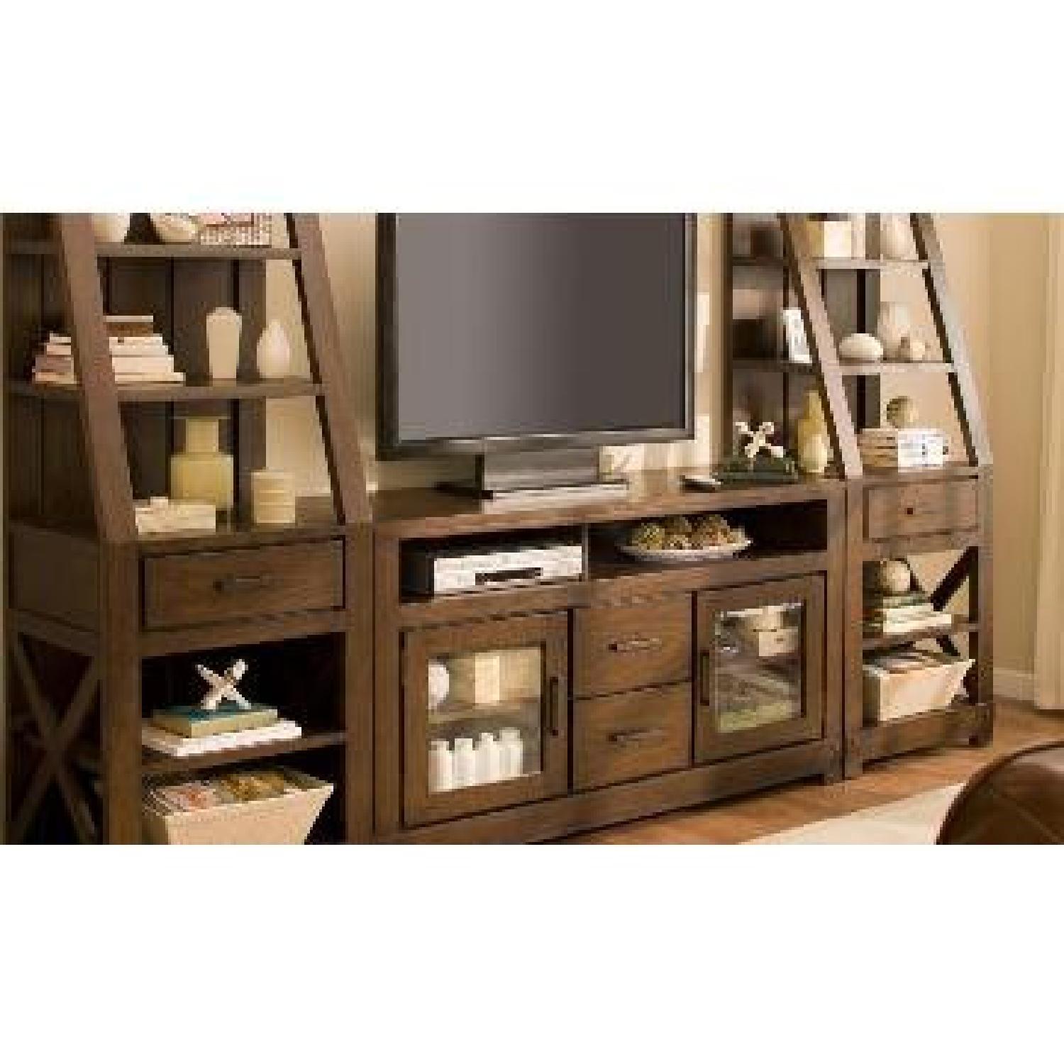 Raymour & Flanigan Wood Bookcases w/ Drawers AptDeco