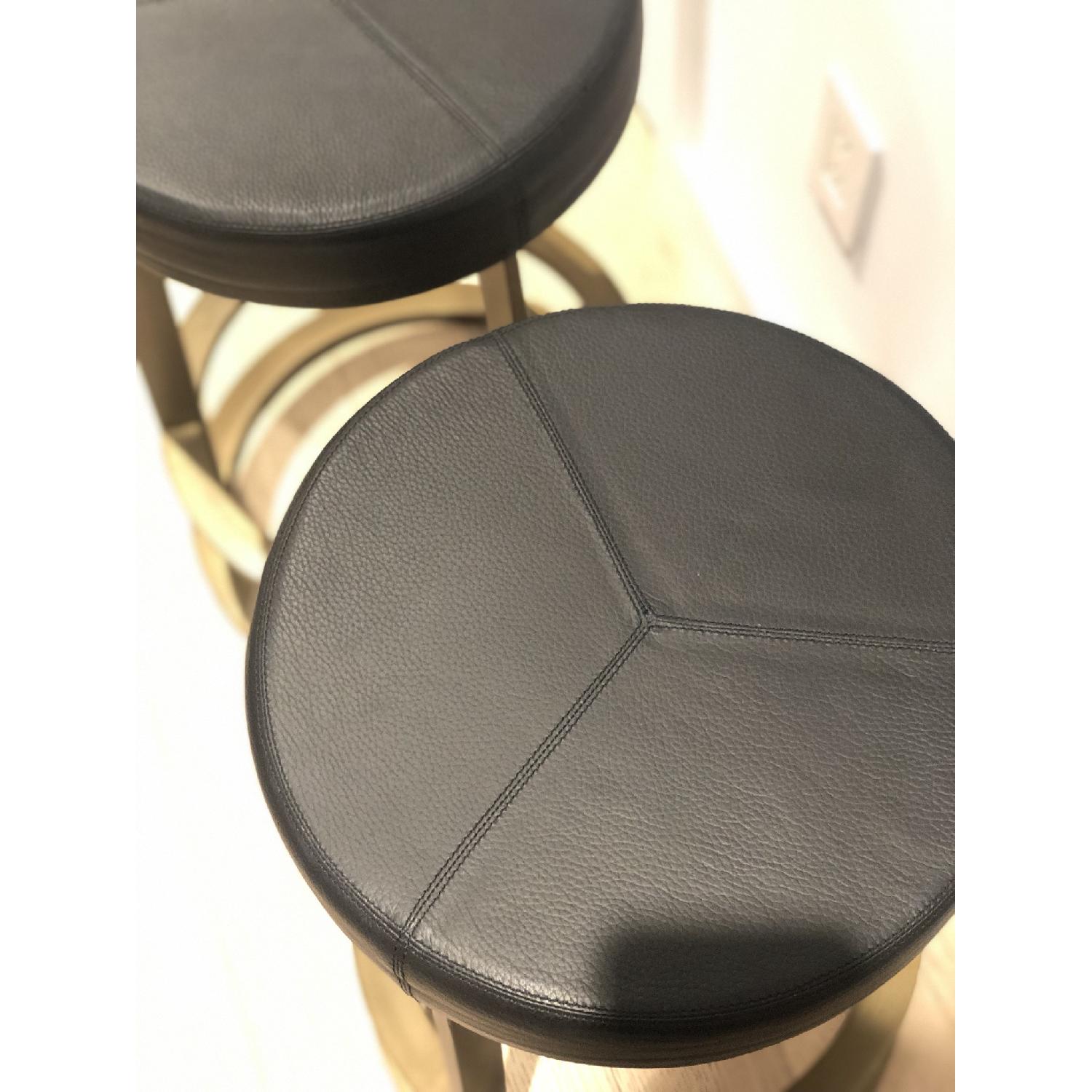 CB2 Leather Reverb Stools AptDeco